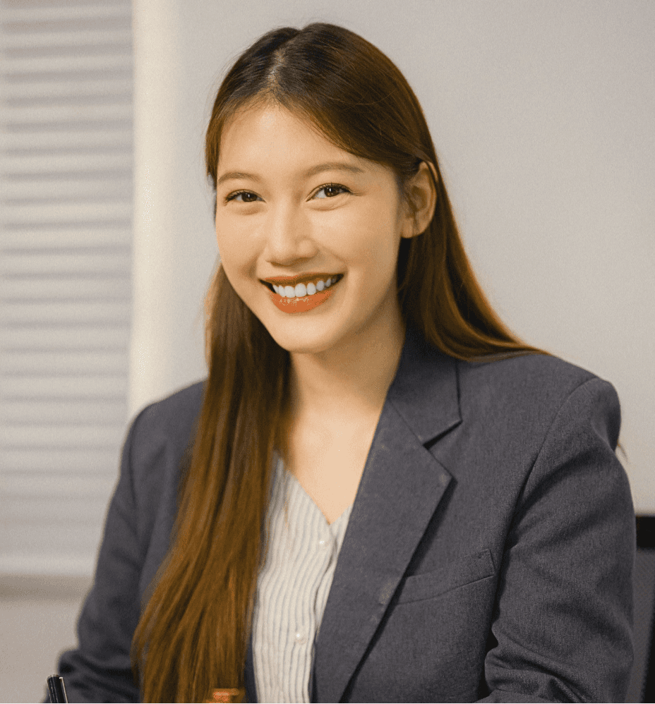 woman sitting around table holding tablet