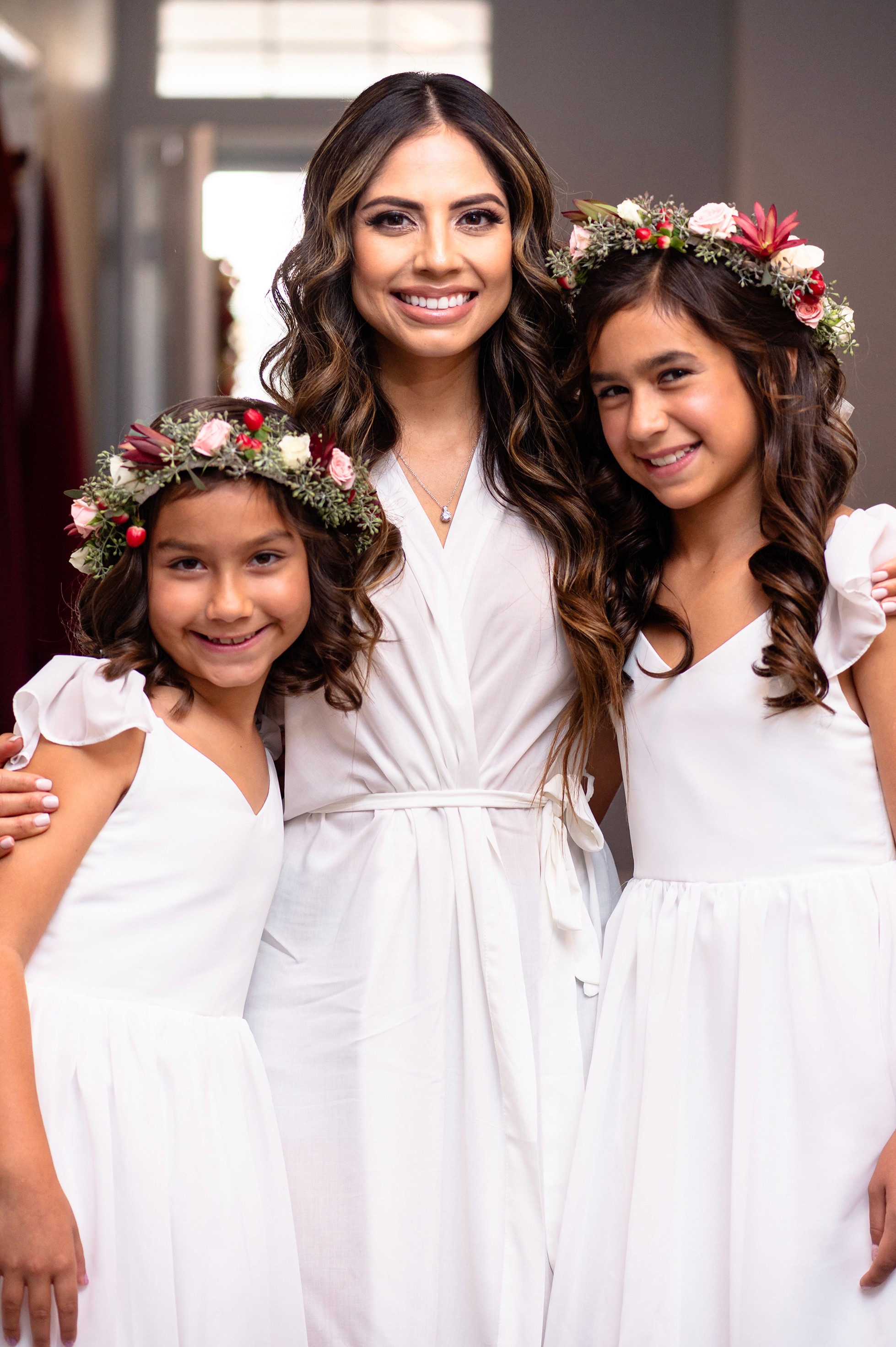Flat lay wedding details with bouquet, rings, and sparkling bridal heels