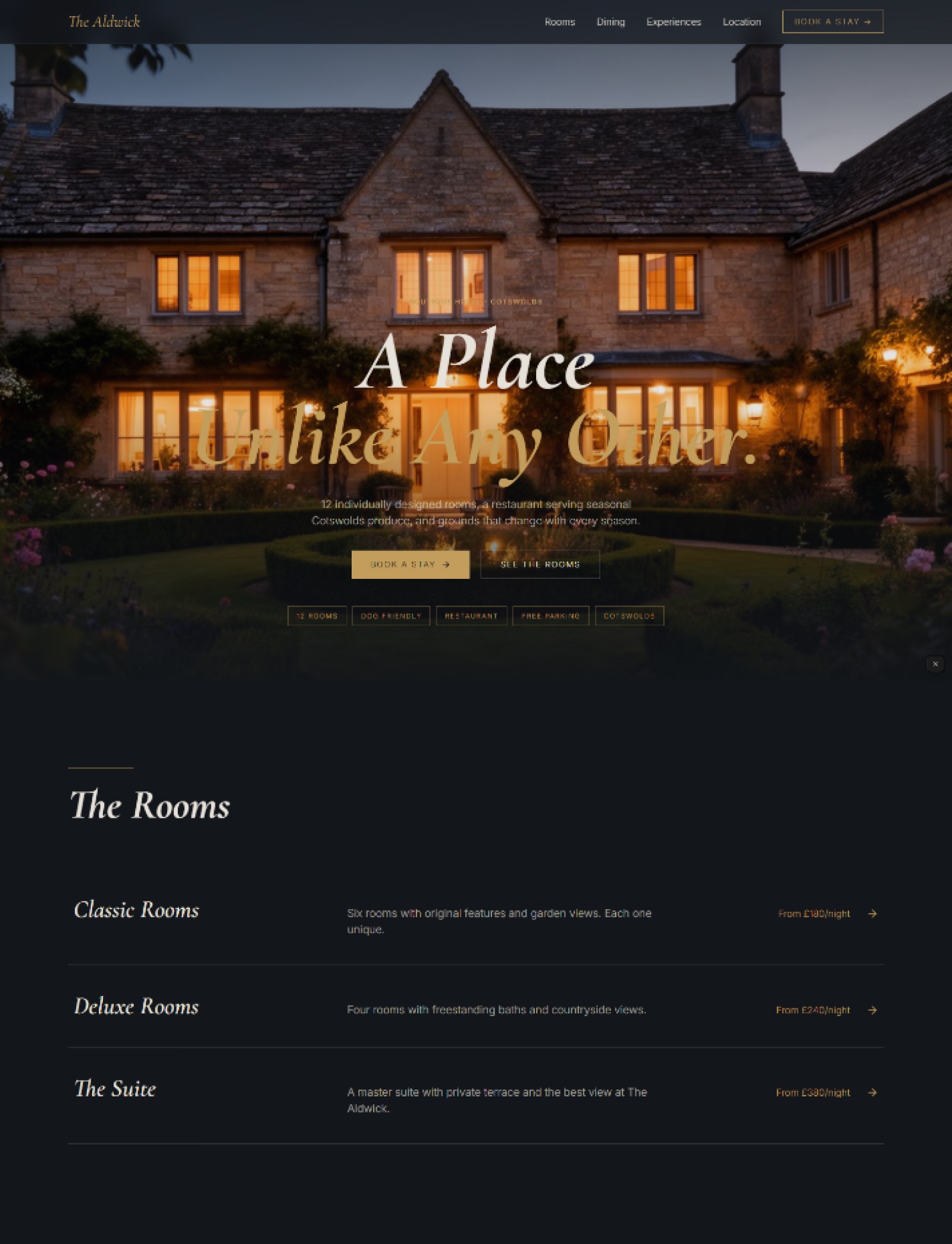 Boutique hotel website prompt — deep slate and warm gold luxury boutique hotel countryside website design preview