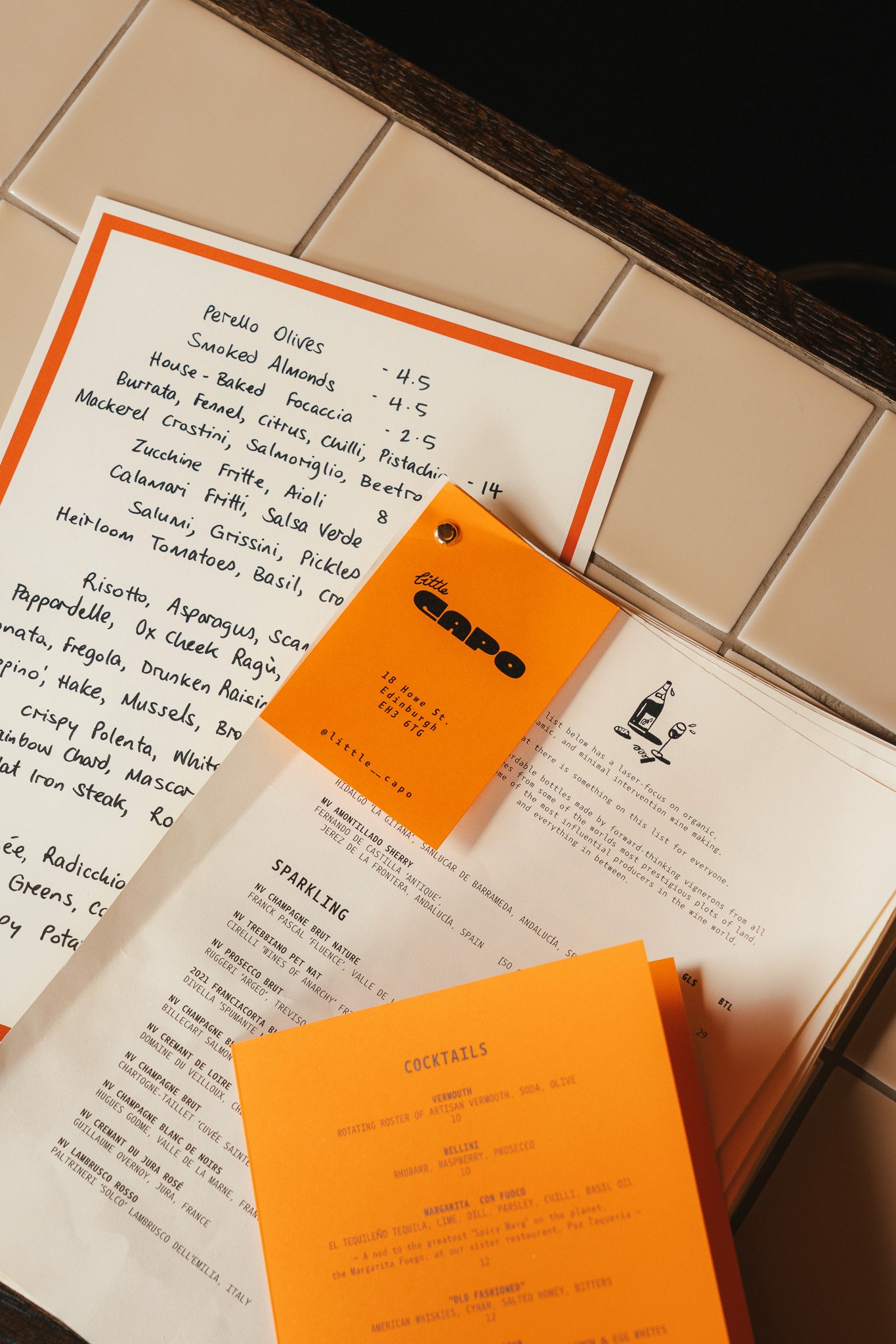 Little Capo restaurant branding, designm and architecture by S+Co. Photography by Stephen Liste