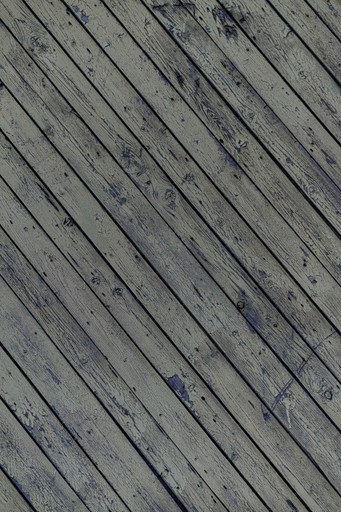 Weathered wooden planks arranged diagonally