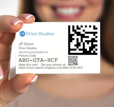 student-holding-paperless-card