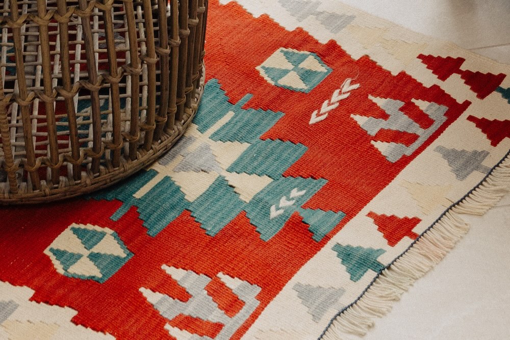 Colorful diamond pattern on a red background