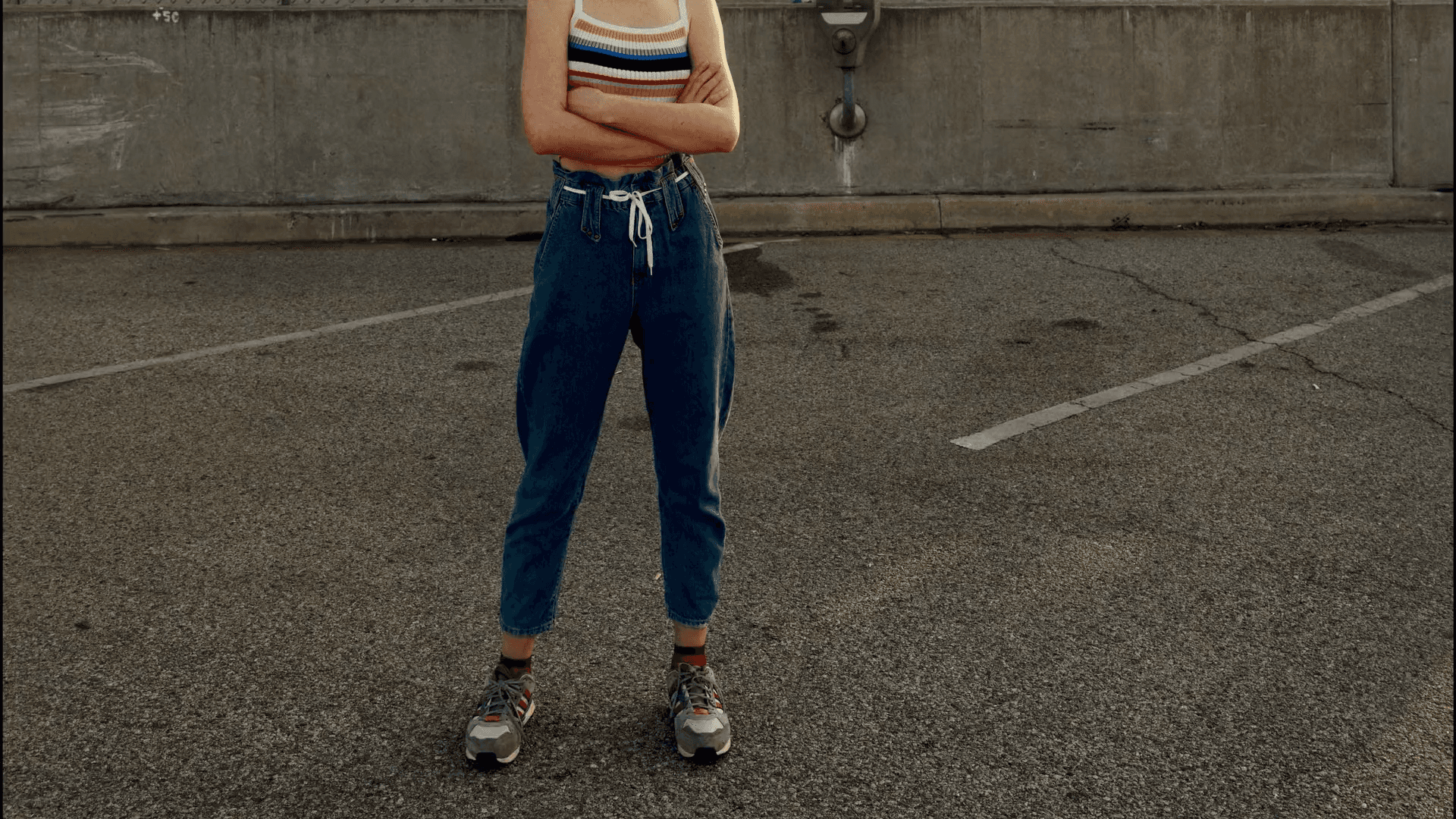 A plane flying in the sky at sunset