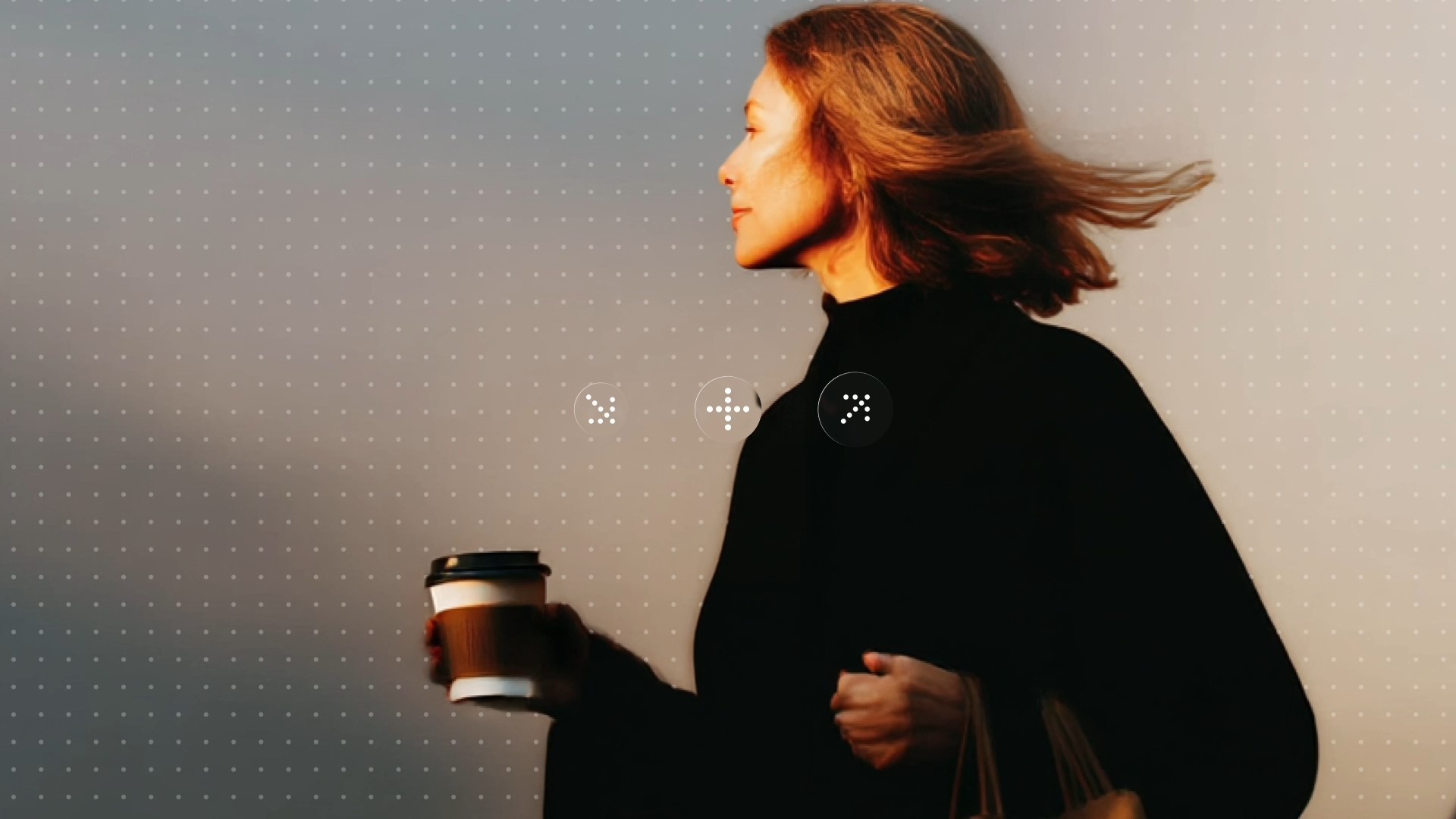 a girl holding a coffee cup