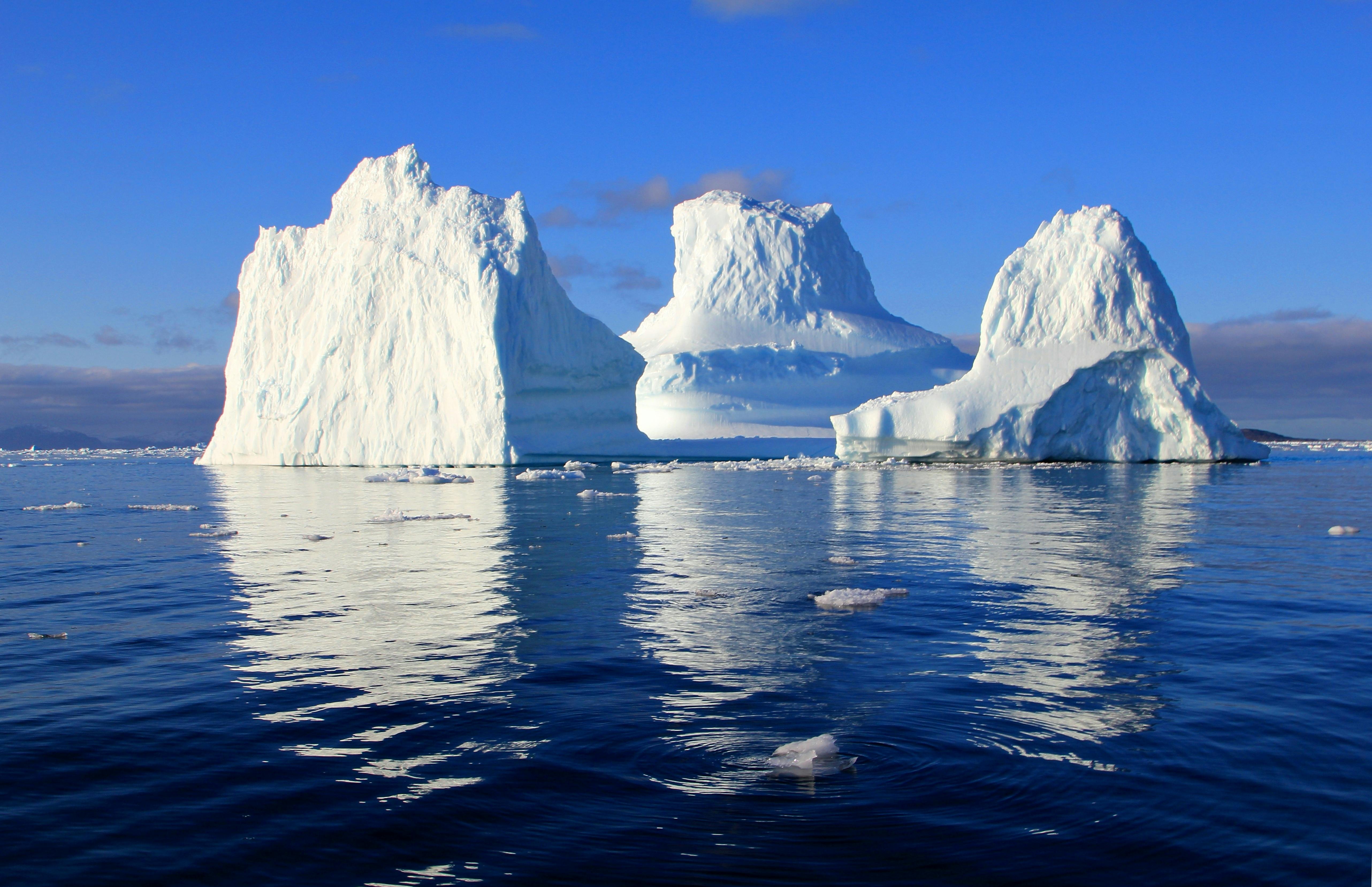 Mount of Ice in the Middle on Body of Water