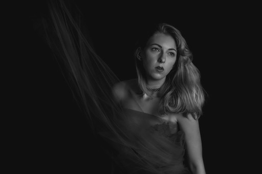 White sand beach with sunset in the background