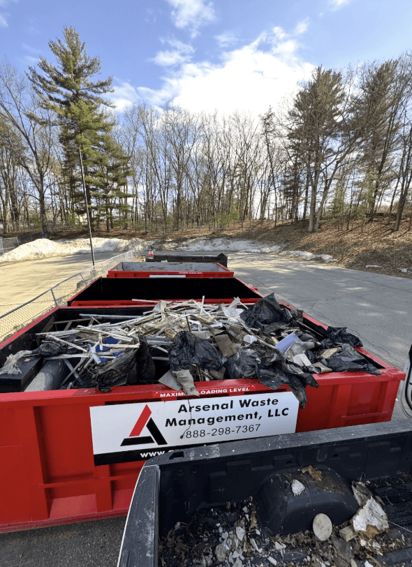 Junk removal dumpster load
