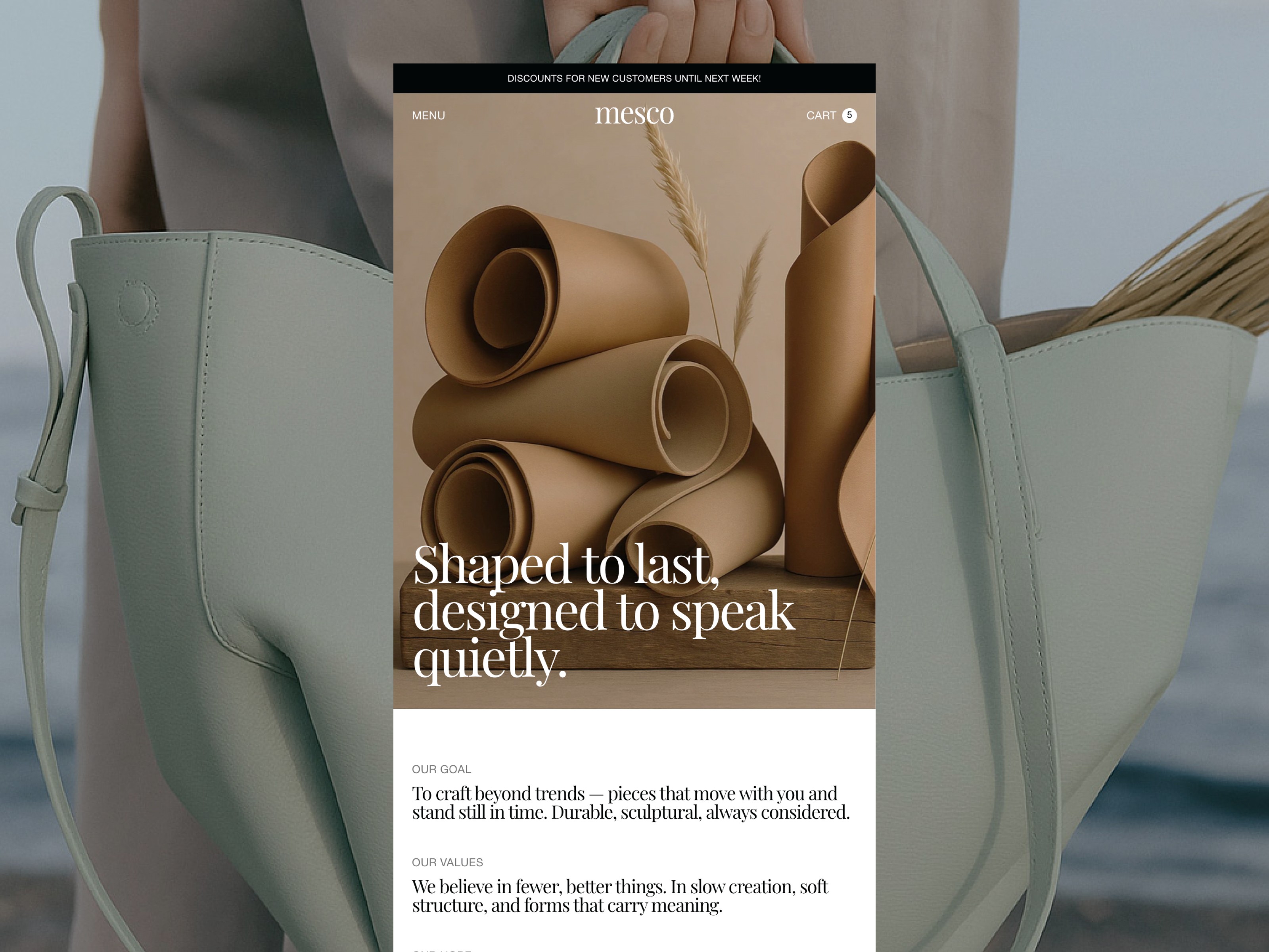 Mesco website template about page showing a sage green tote bag alongside sculpted paper roll 3D objects with the headline "Shaped to last, designed to speak quietly" and brand values text on a light background