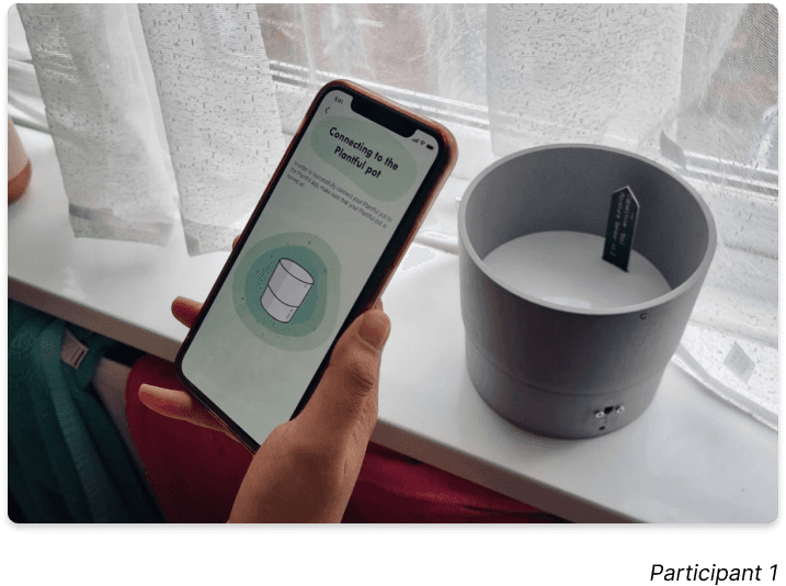 Phone in hand with plantful app participant 1