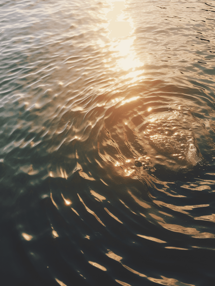 Gentle ripples in golden light, evoking healing from trauma, emotional depth, and soothing mental restoration.