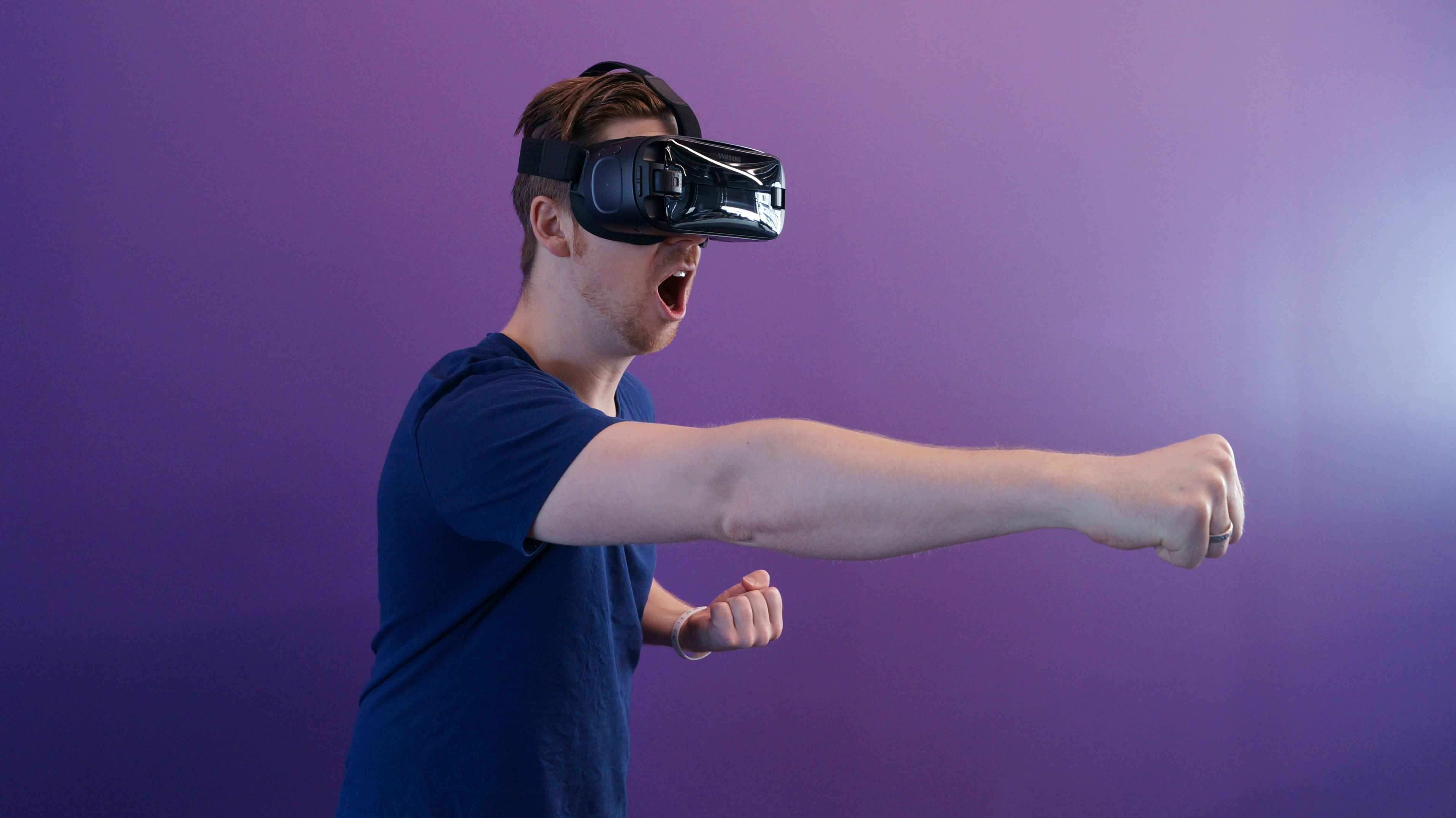 Man engaging with virtual reality technology in an interactive experience