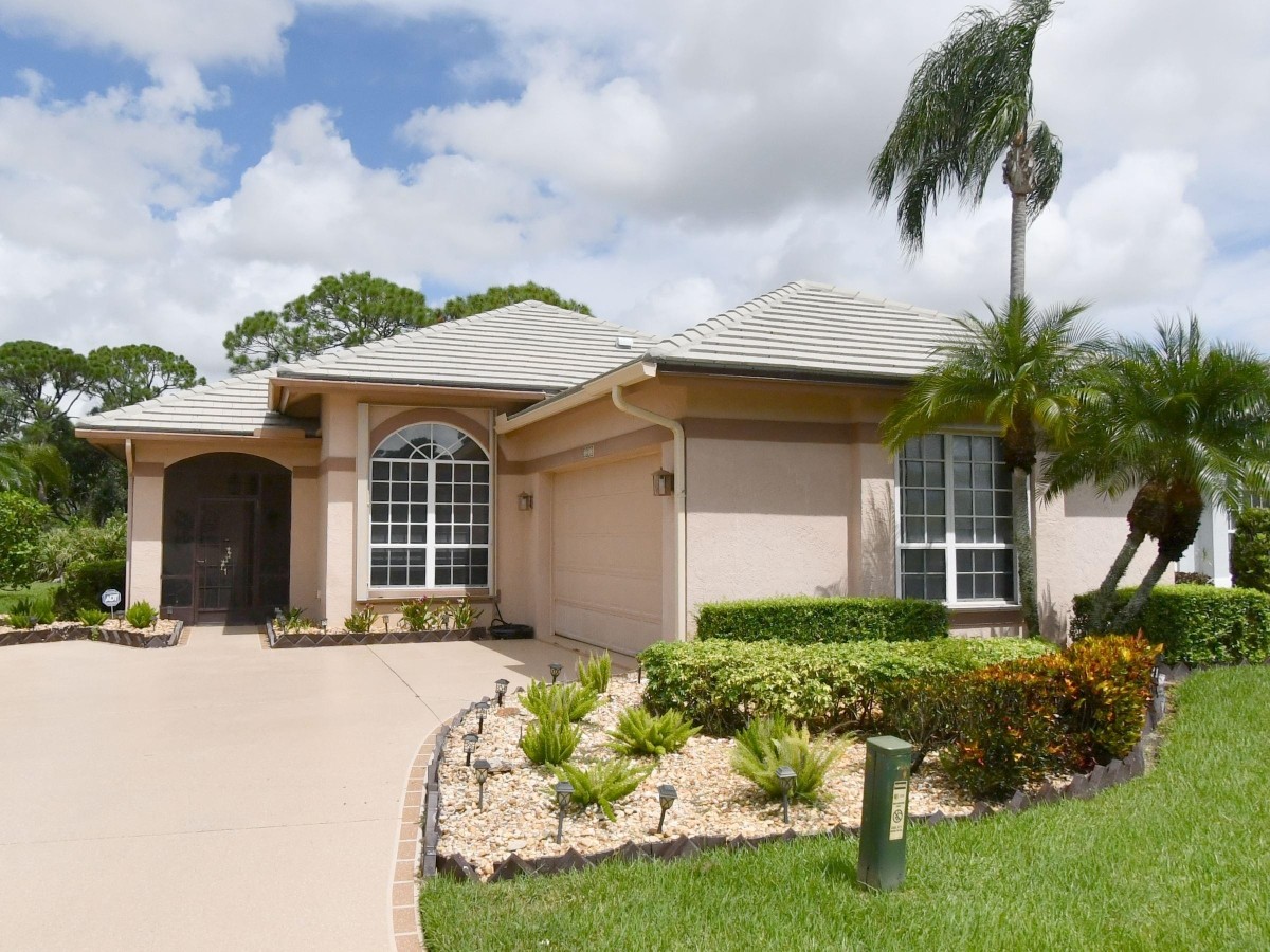 1995 New Roof Construction in Marsh Landing, PGA Village, Port St Lucie with Entegra Flat Broomswept Tile in Natural Gray