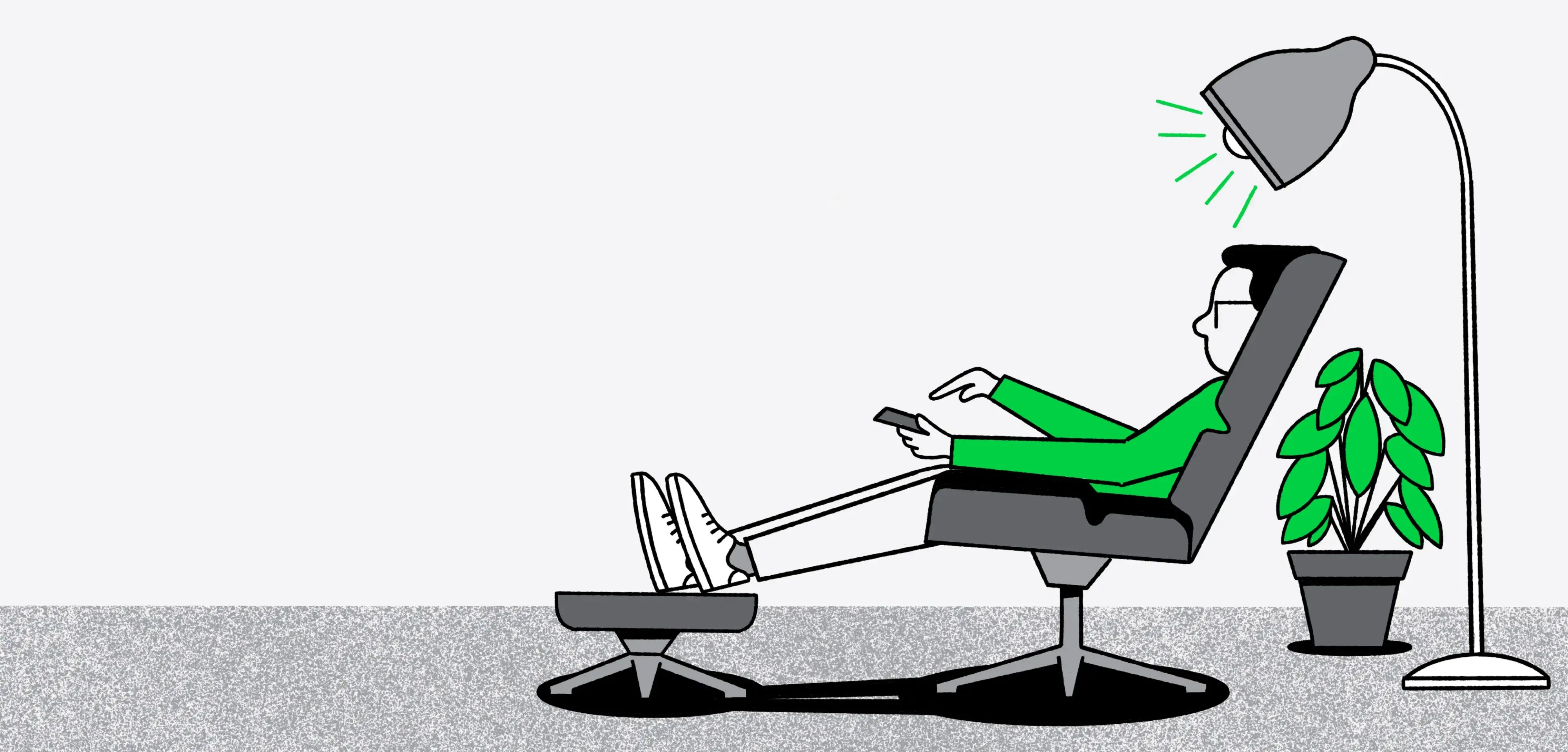 man in gray shirt standing near fireplace