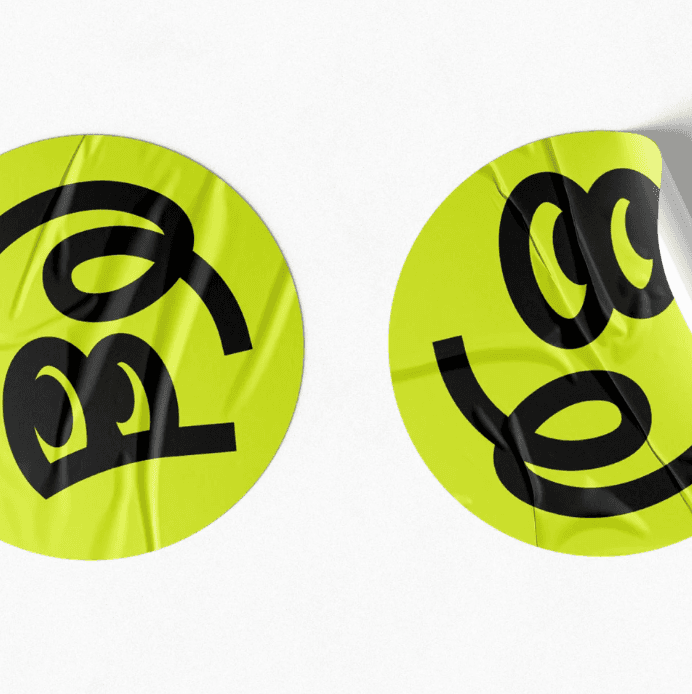 Abstract smiley logo pattern in bright yellow and black