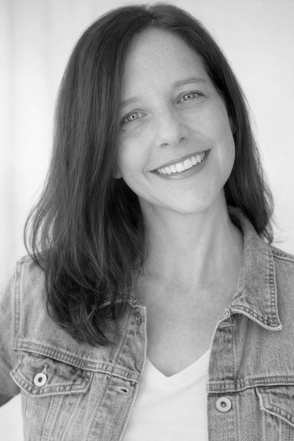 a blurry photo of a person standing in front of a wall