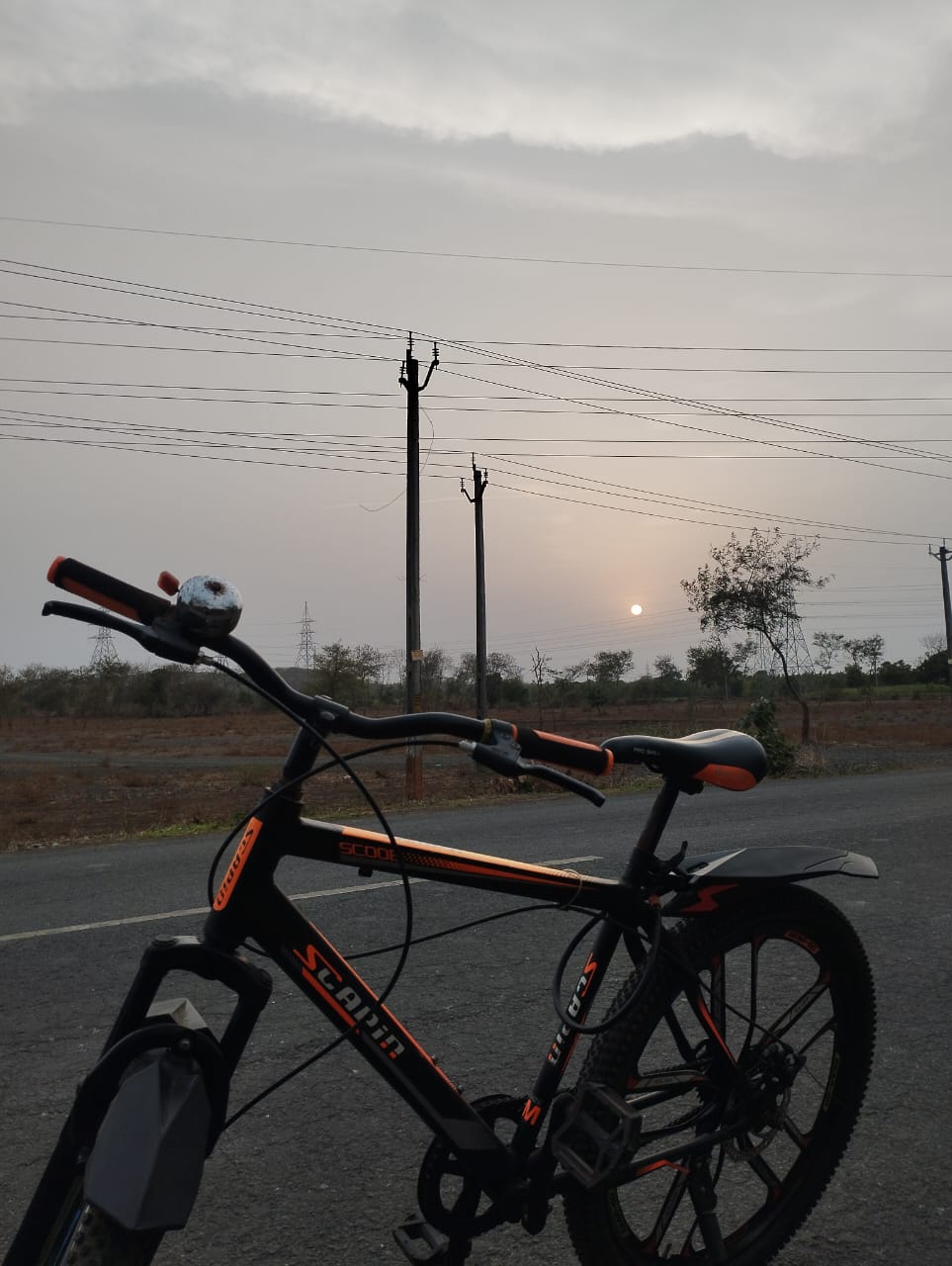 cycle with sunset view