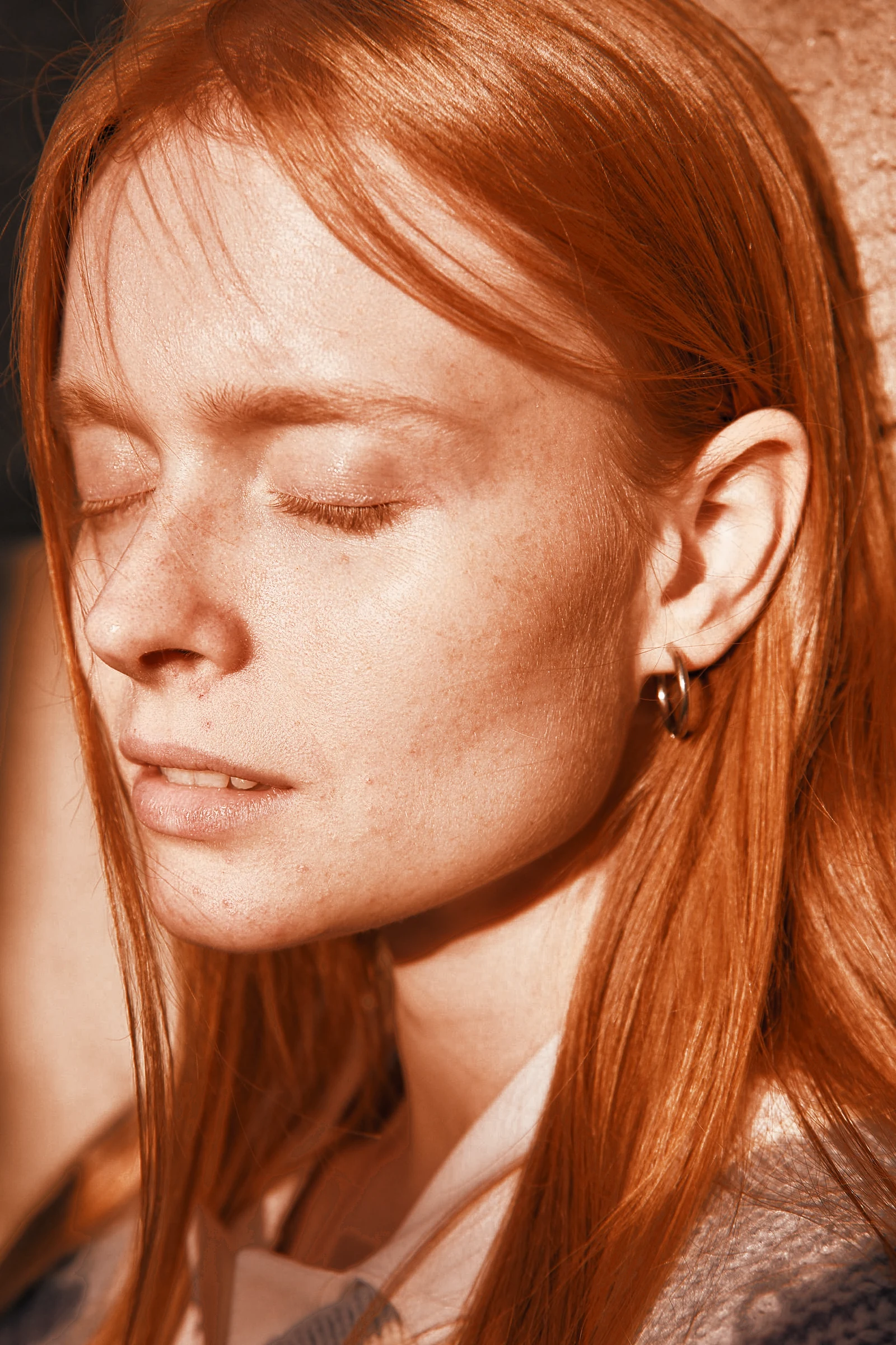 Hoop earring in warm sunlight