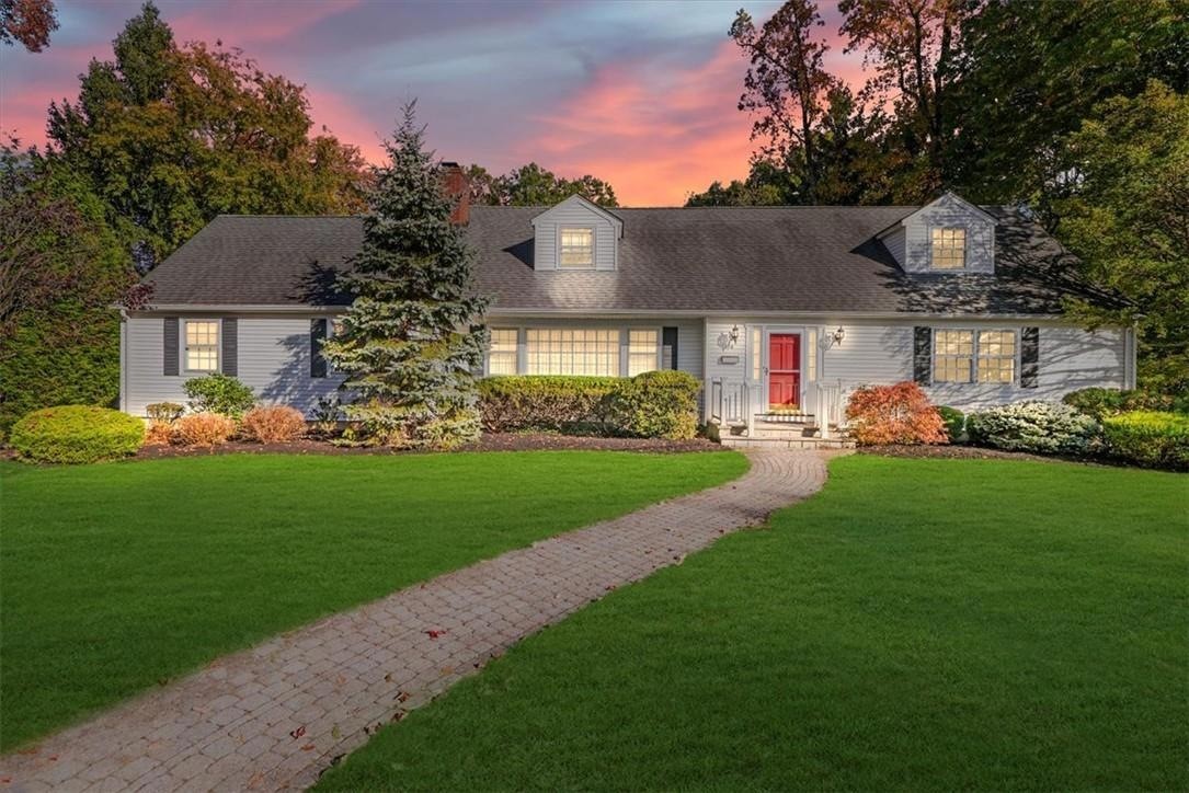 white and gray wooden 2-storey house
