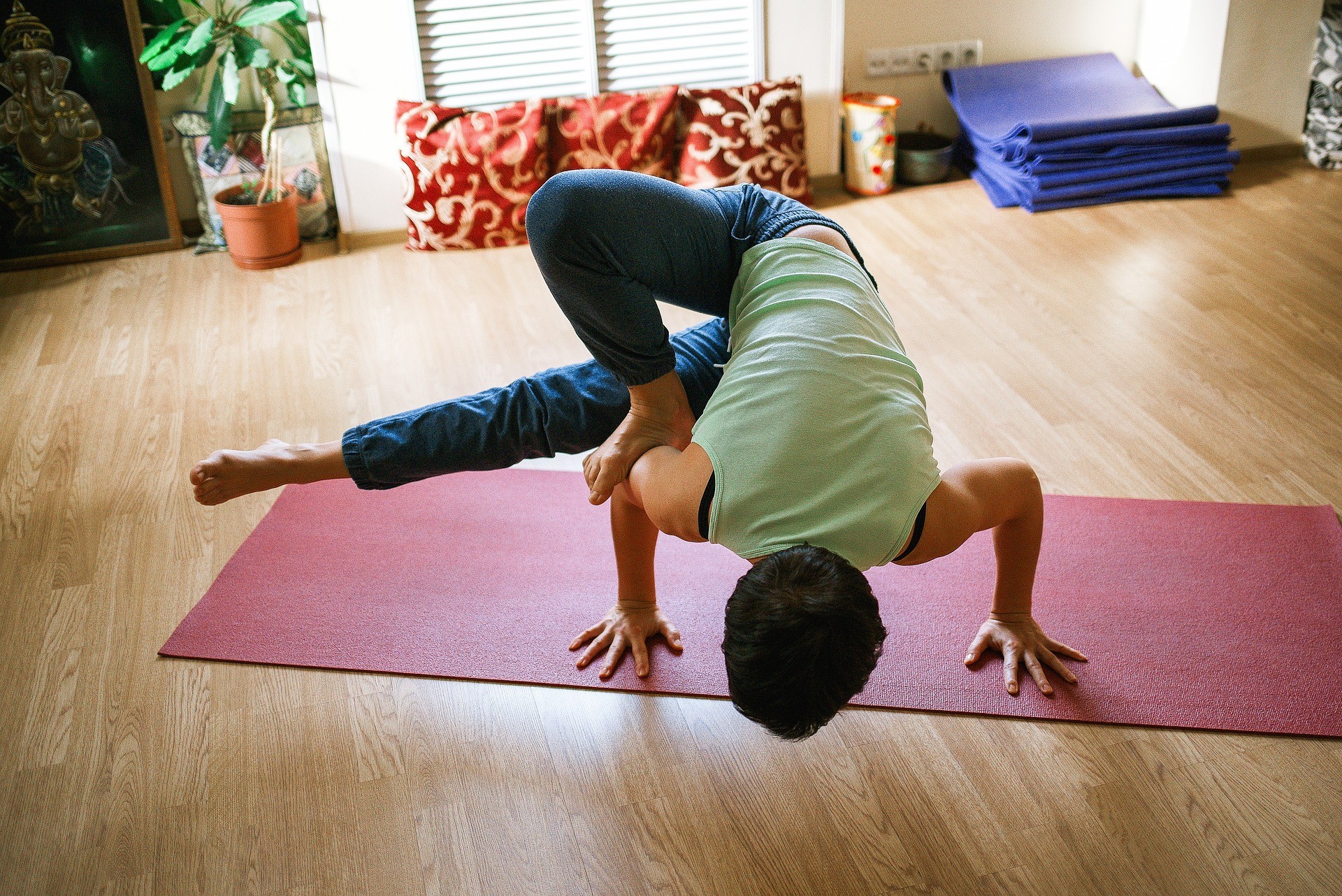 A man using yoga equipment