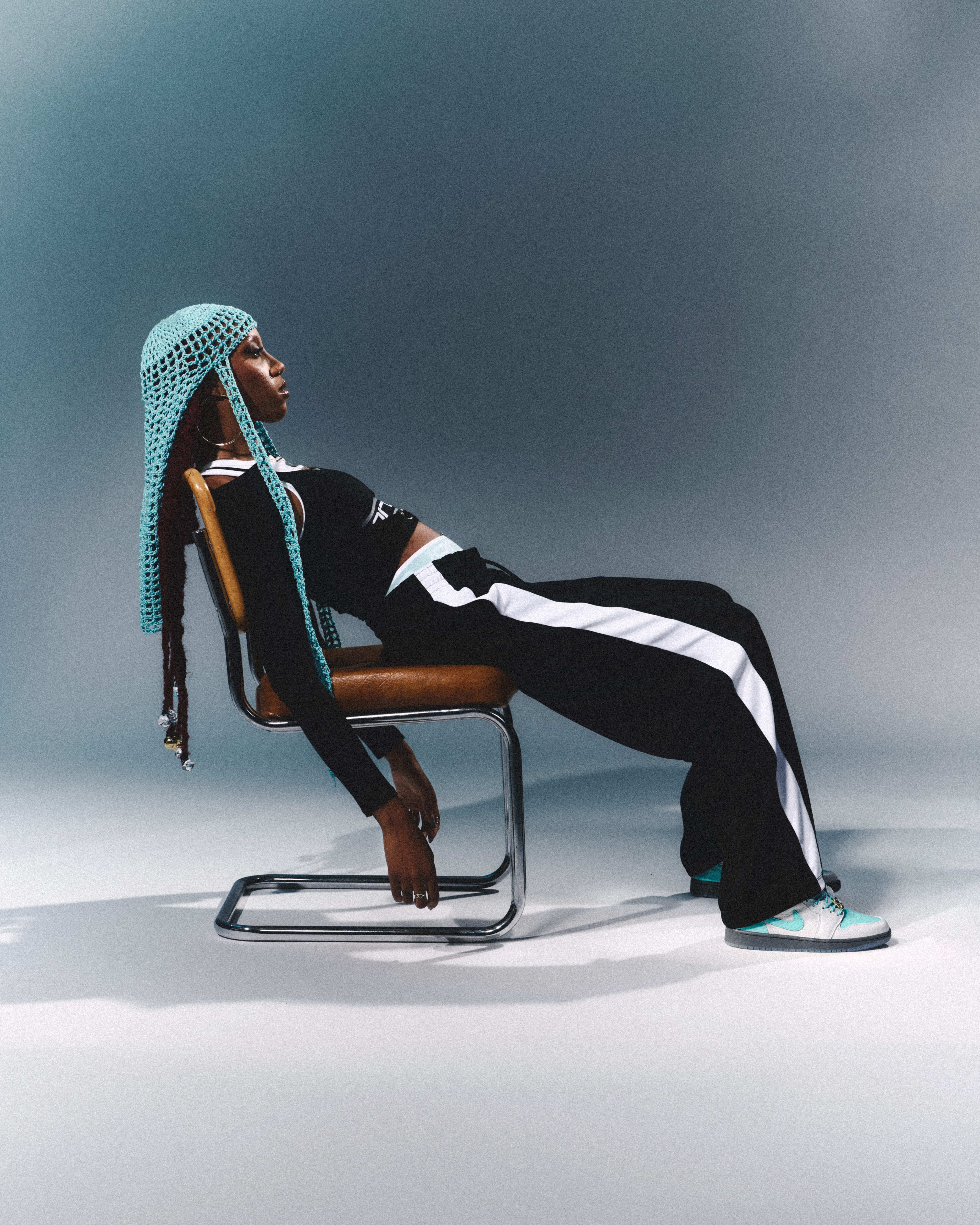 Snow-capped mountains viewed through a car window.