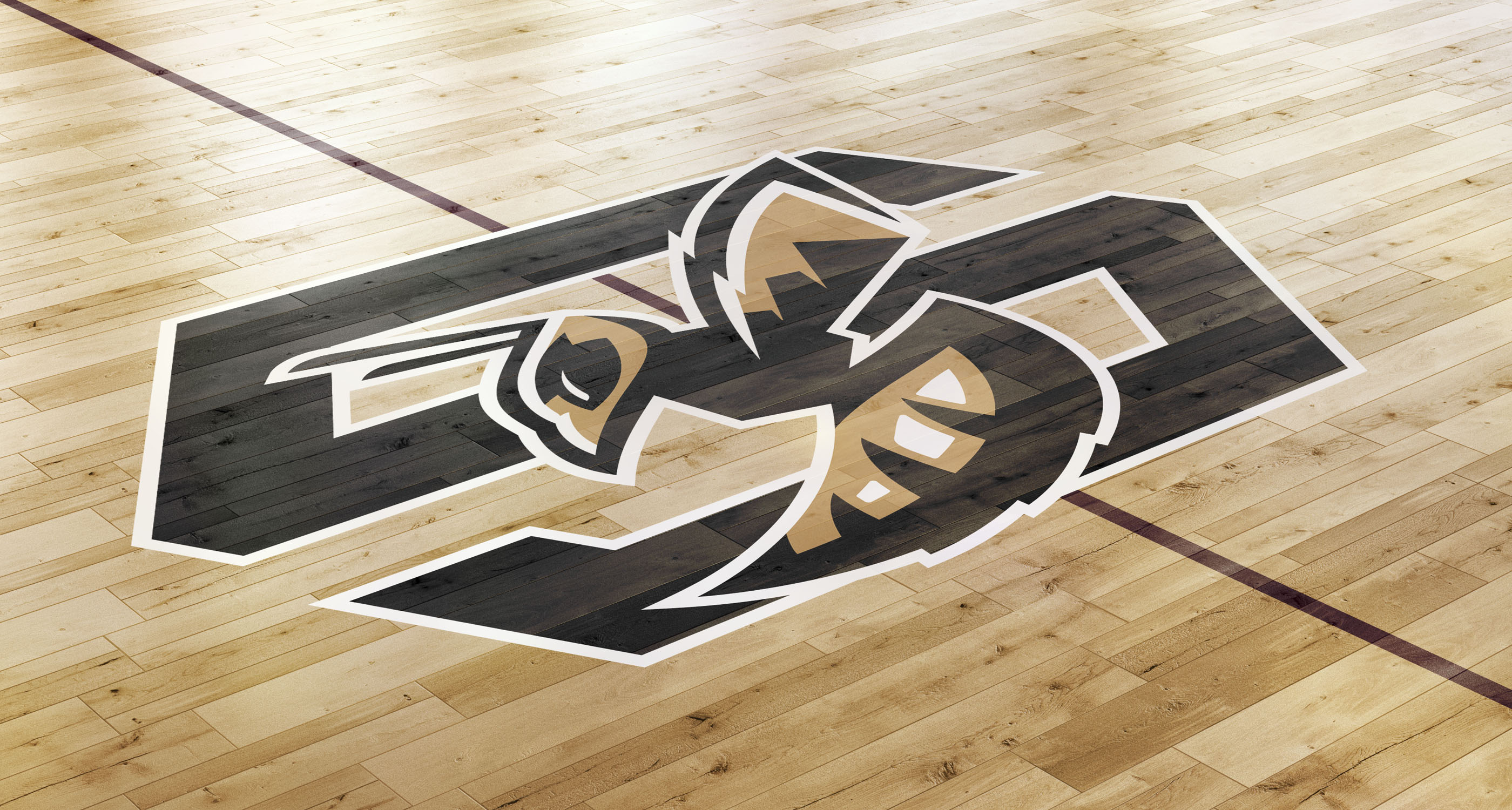 Stevensville School alternate logo mocked up on gym floor.