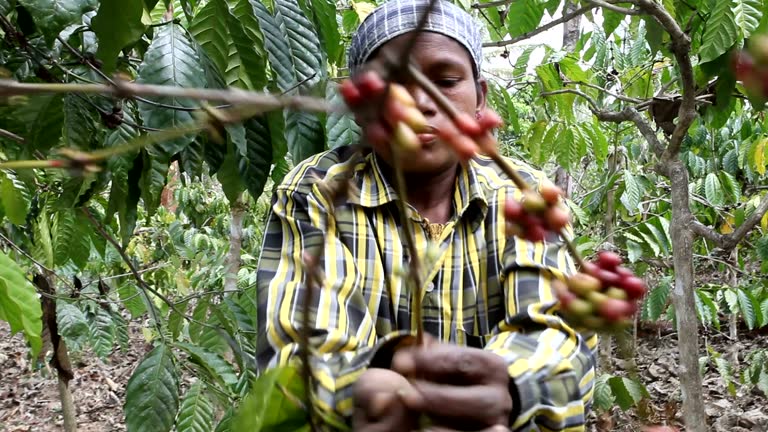 man and woman sitting on concrete bench during daytime