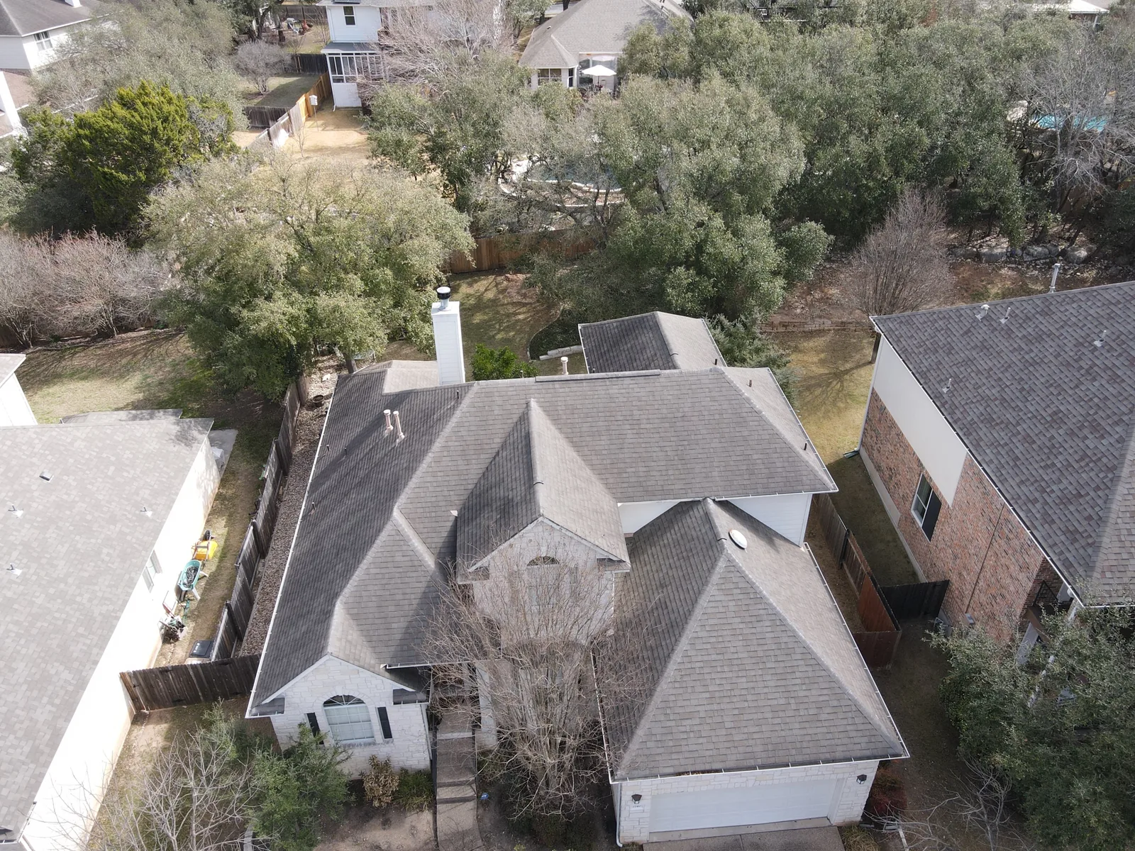 Before - another angle: shingle upgrade across multiple gables.