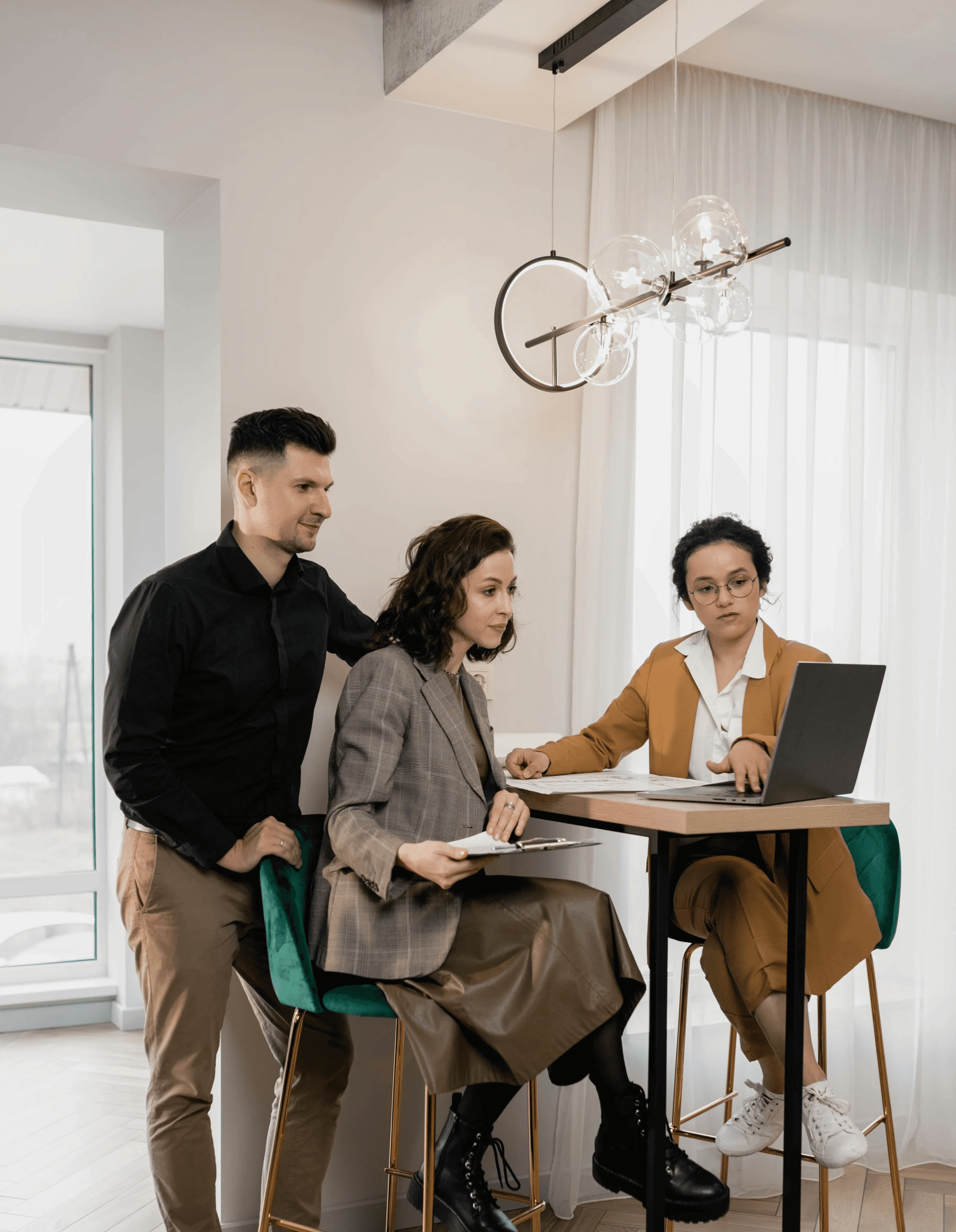 A man and a woman consulting with a property expert