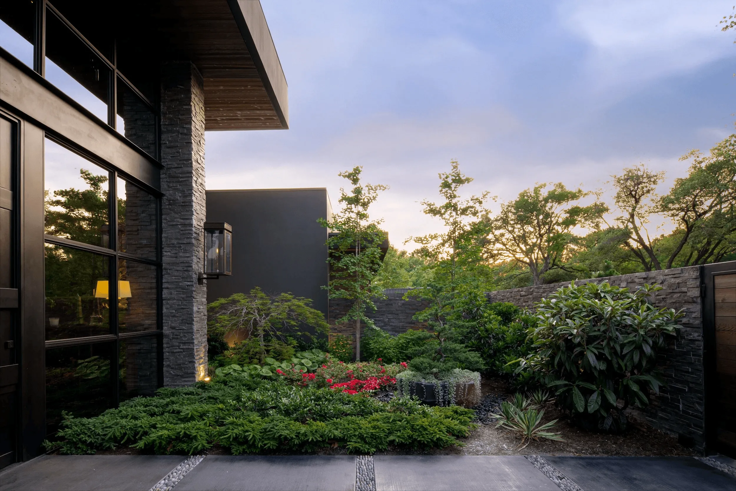 Layered garden beds with ornamental grasses and perennials in Dallas-Fort Worth