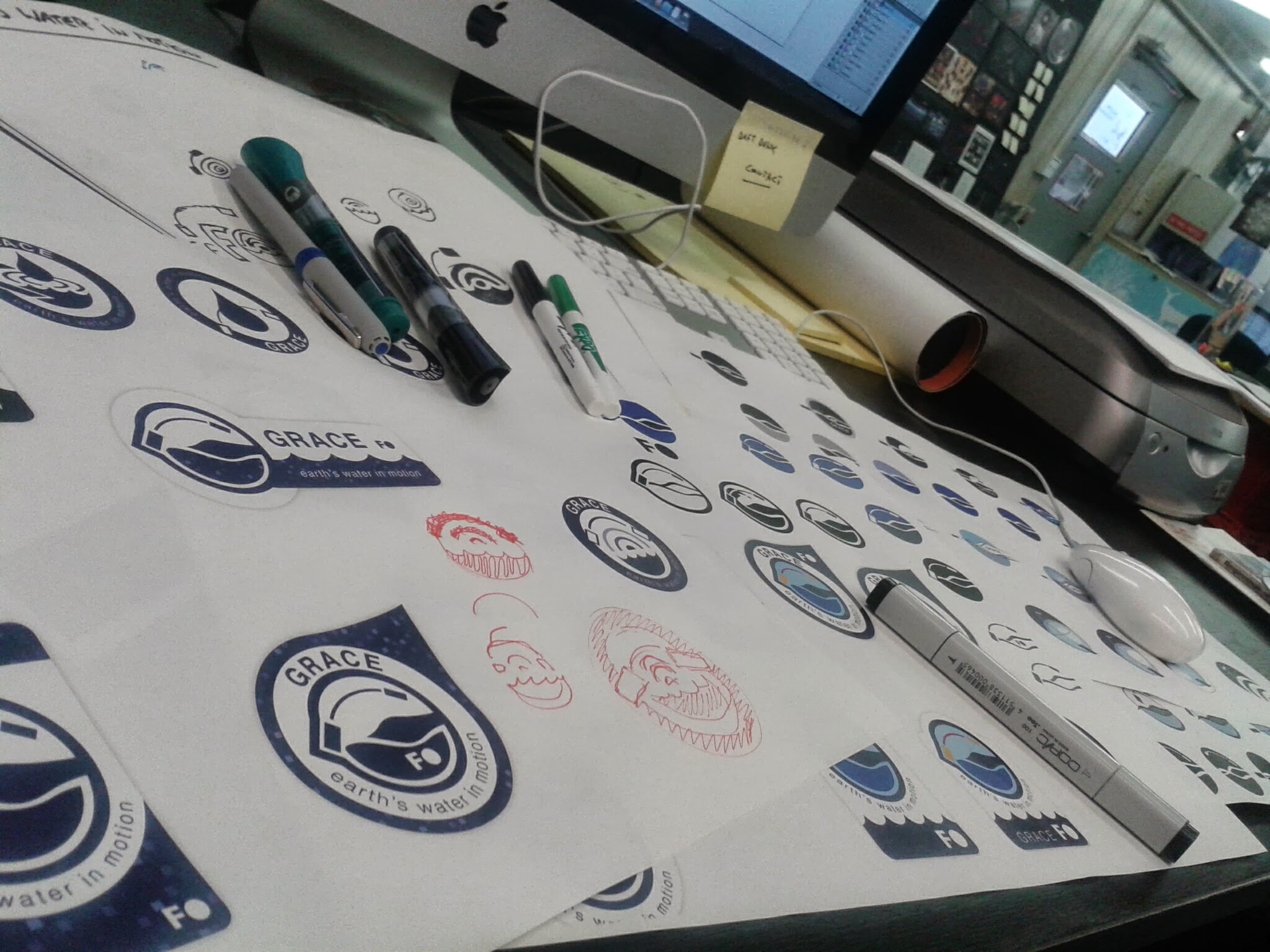 logo design proposals on paper