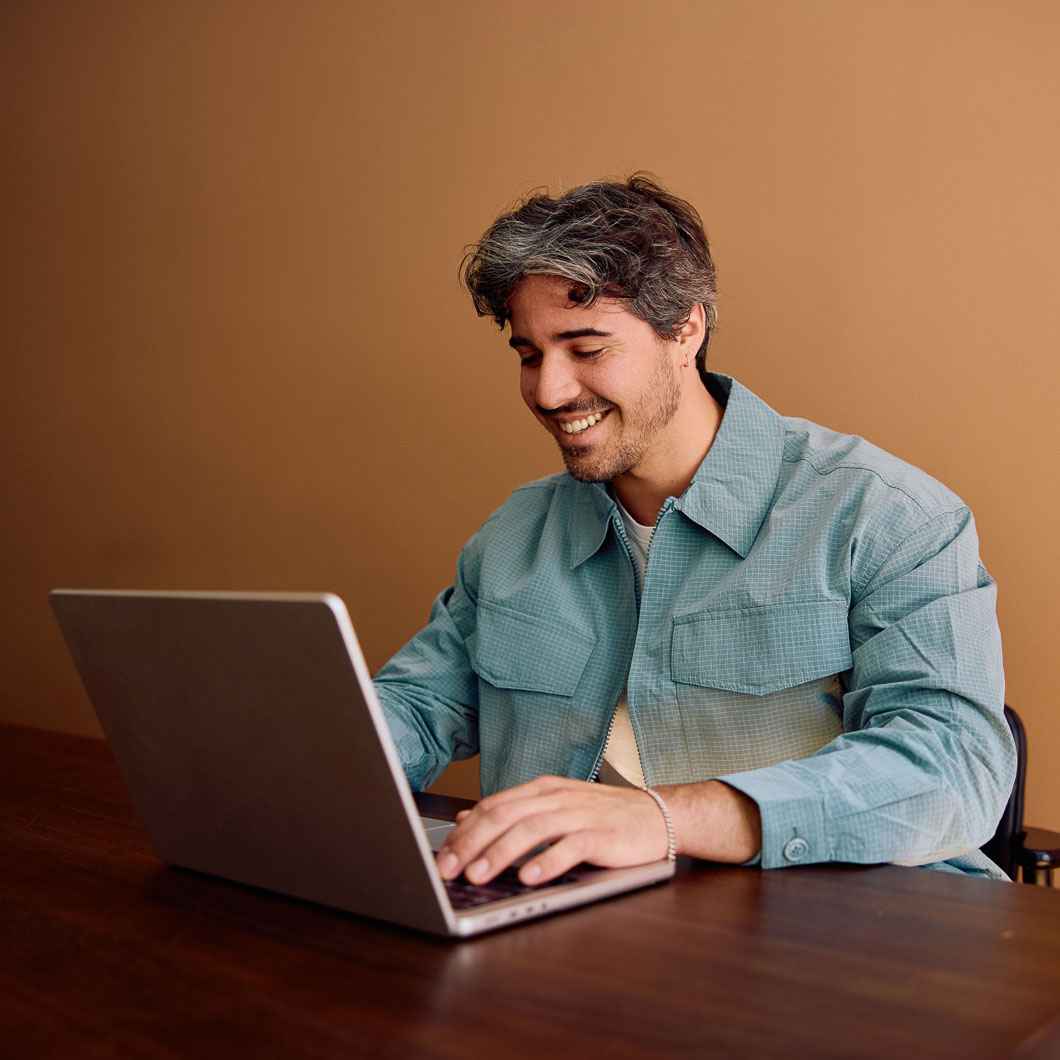 L1 visa lawyer working on laptop in office