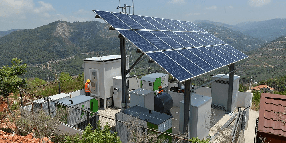 solar panels on green field
