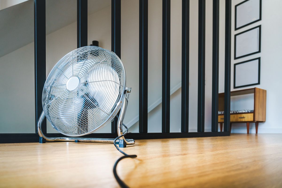 An electric fan used for indoor cooling during hot weather