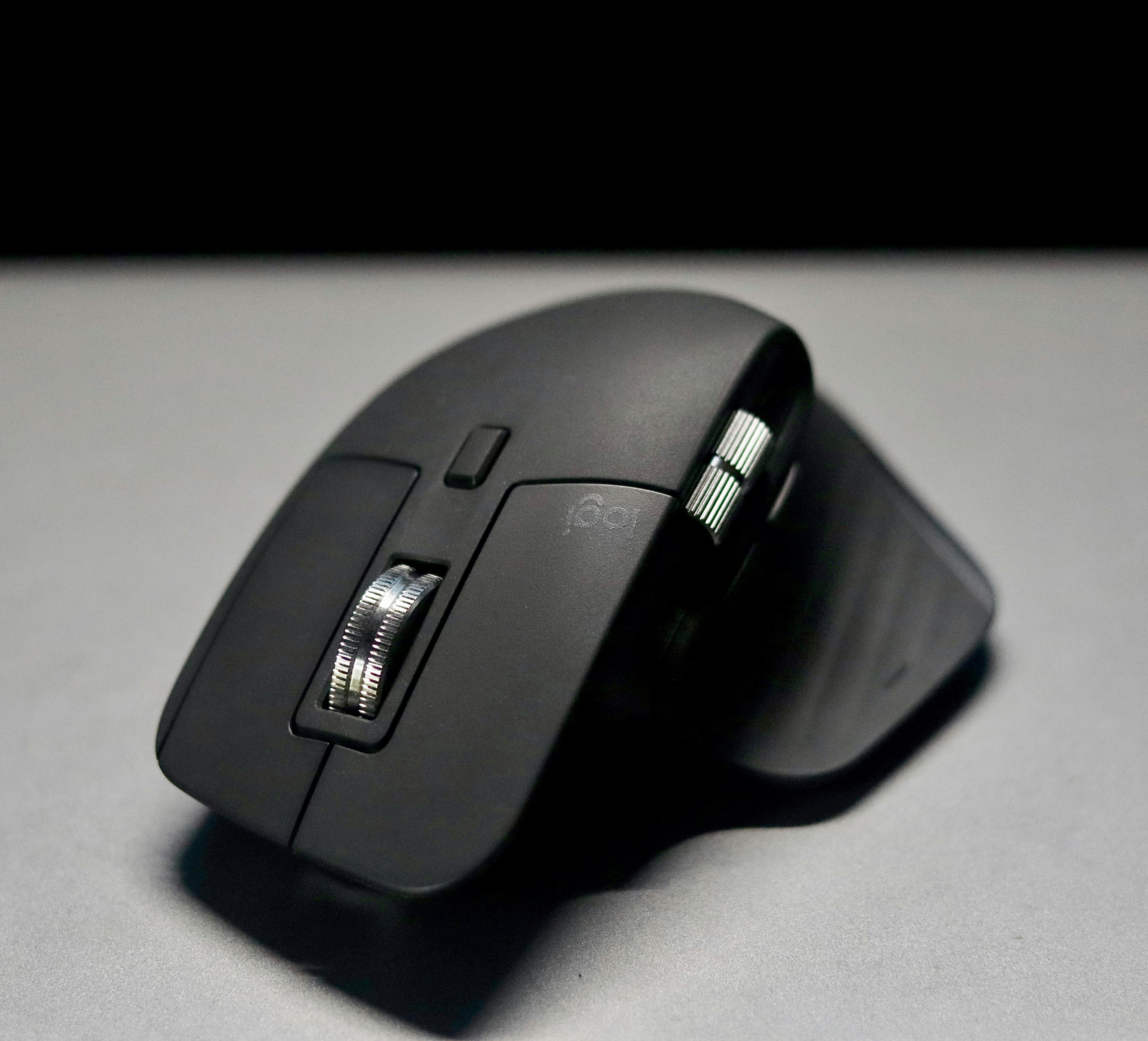 A computer mouse sitting on top of a table