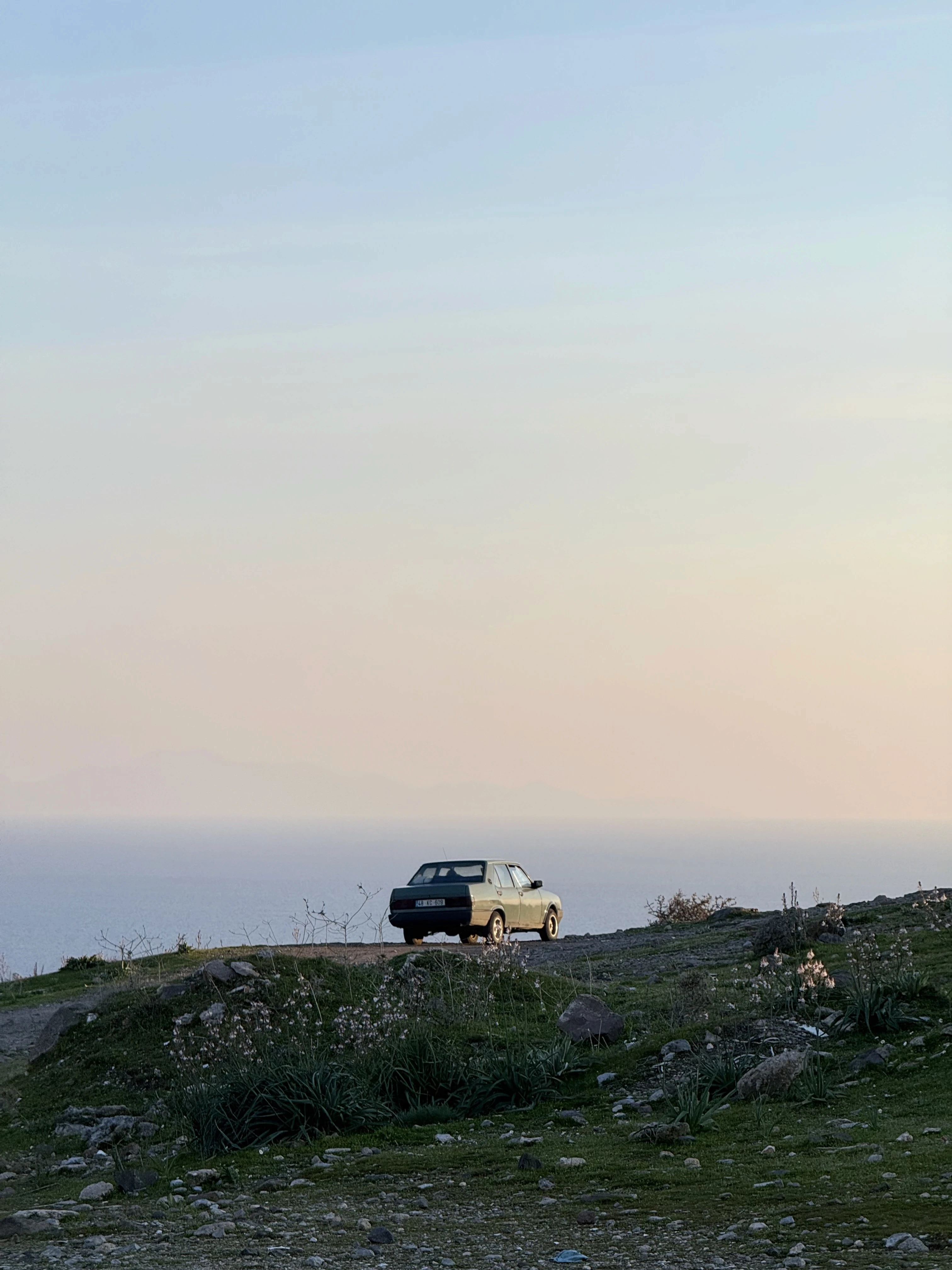 Car standing on a cliff