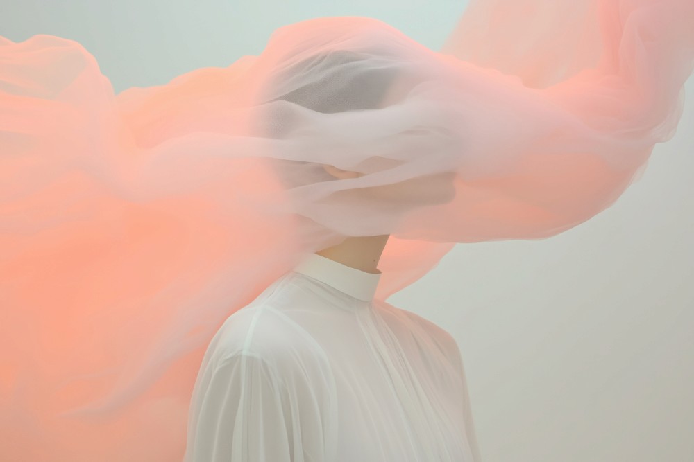 Abstract portrait with layered textures symbolizing emotional complexity and personal reflection.