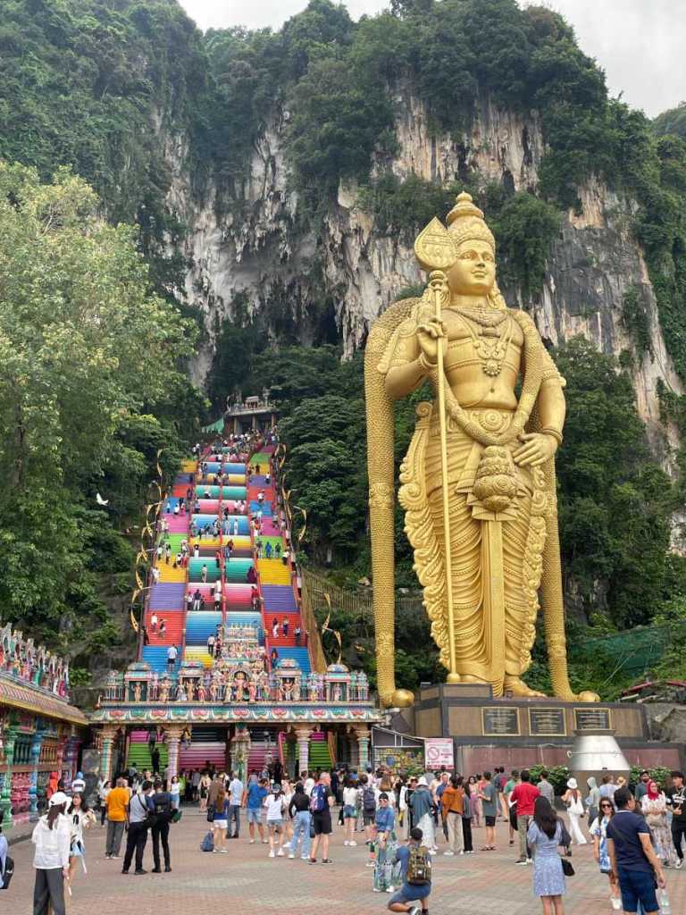 The huge golden statue at the entrance of Batu Caves