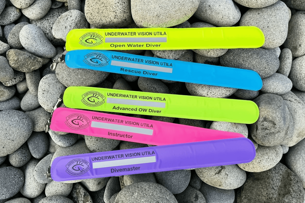 kids lying on a glass land and smiling