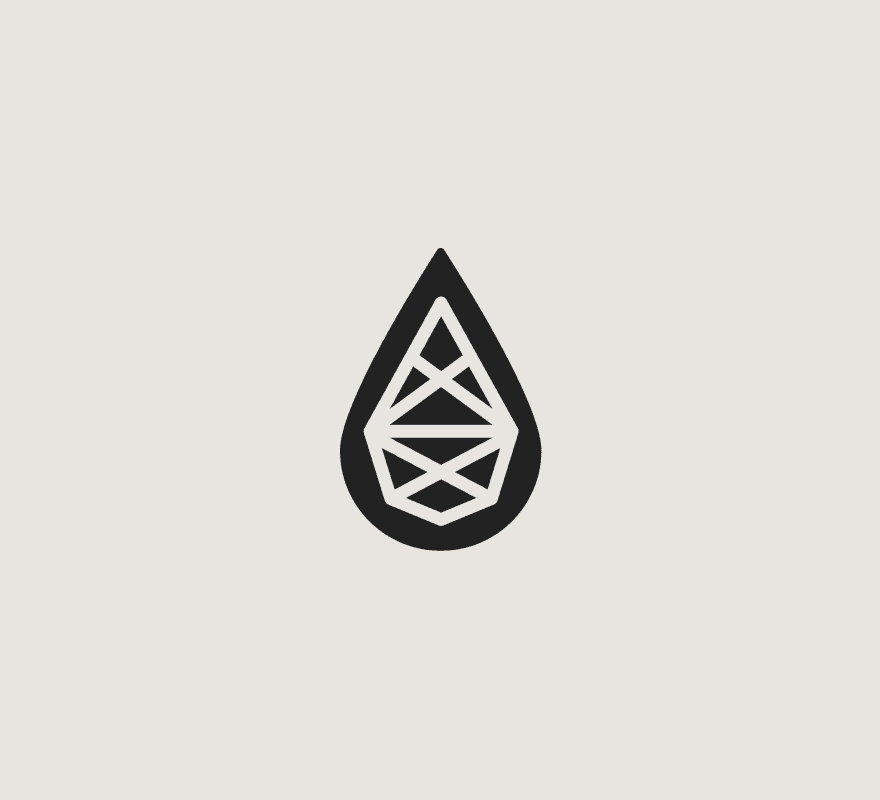 Oil drop icon with a stylized oil rig within.