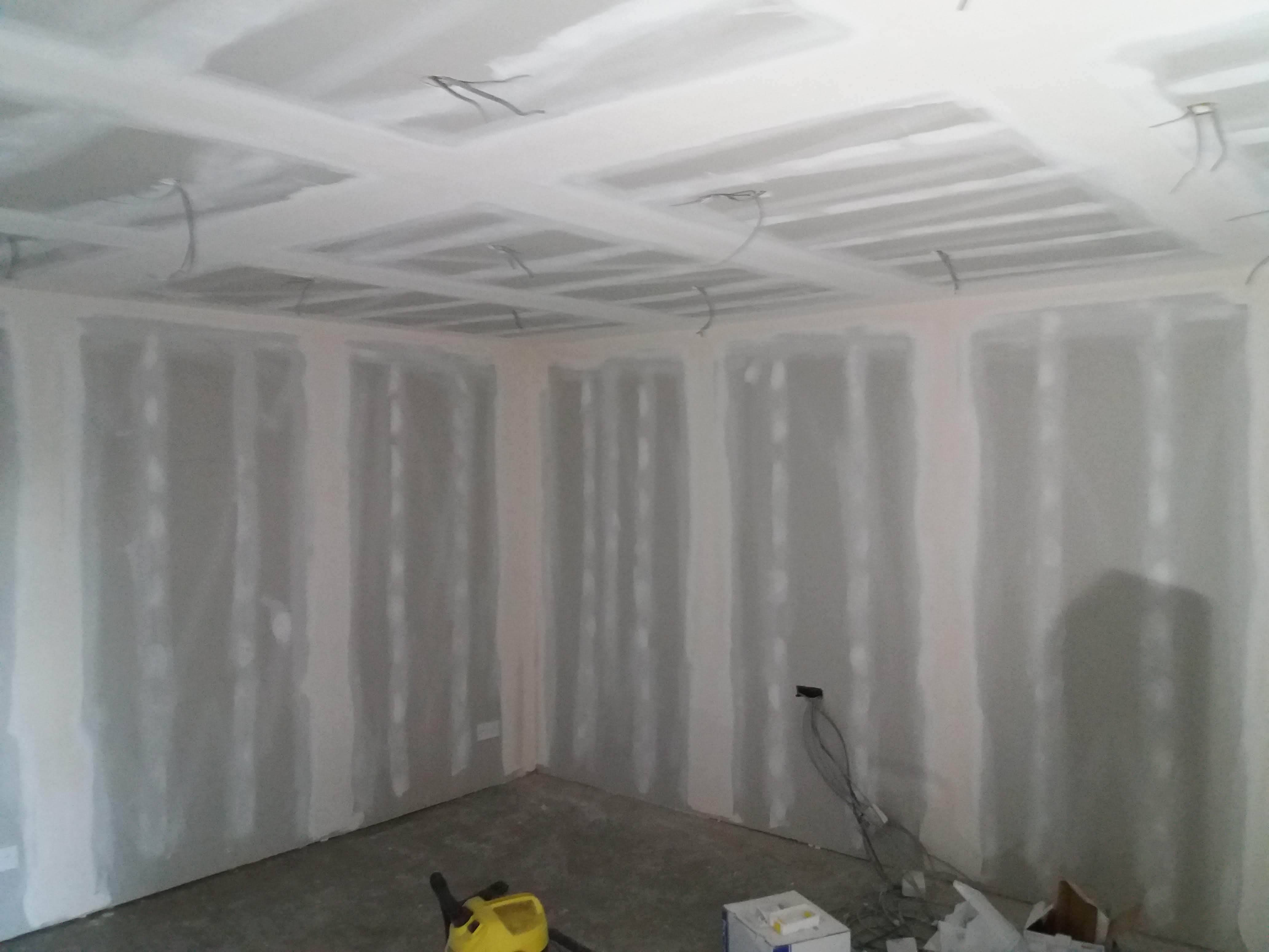 Inside a room with ames taping on the walls