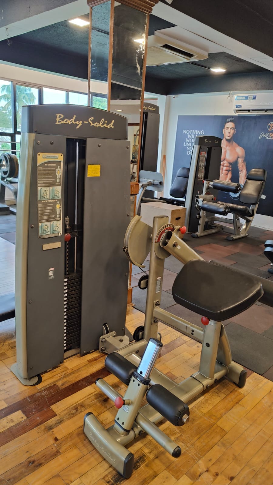 Man working out on tread mills