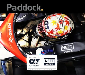 NEFT Vodka and AlphaTauri logos on a sponsored F1 car.