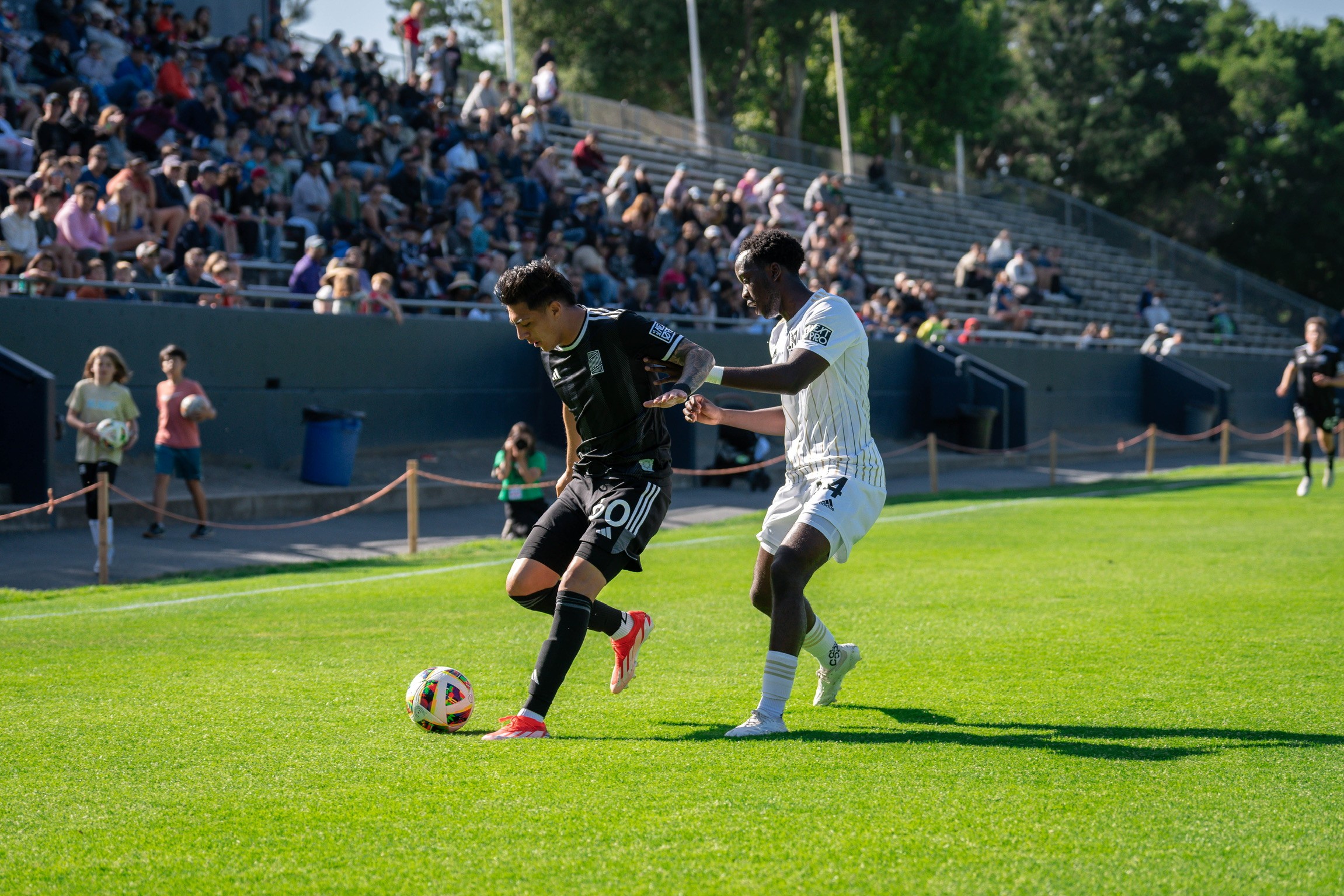 Defending On Sideline In Front Of Crowd At LAFC Away Game