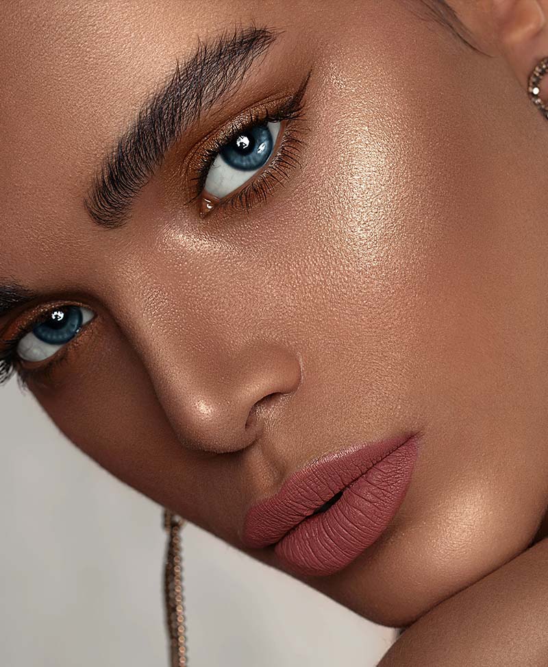 woman wearing sun hat and sleeveless top