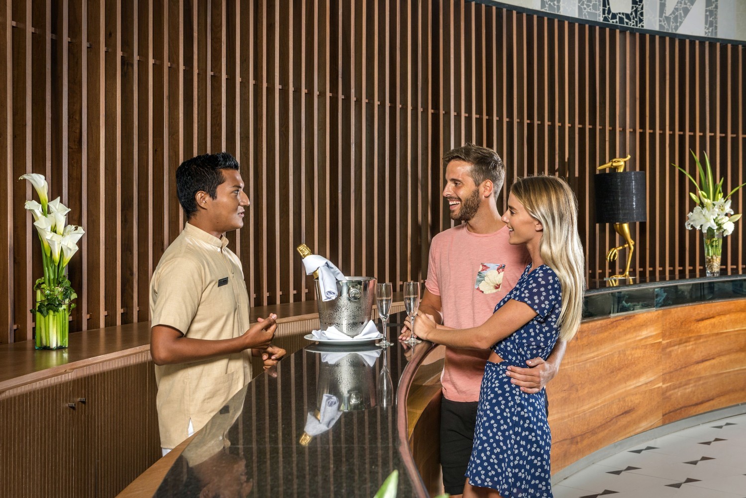Group of people standing in a grassy field