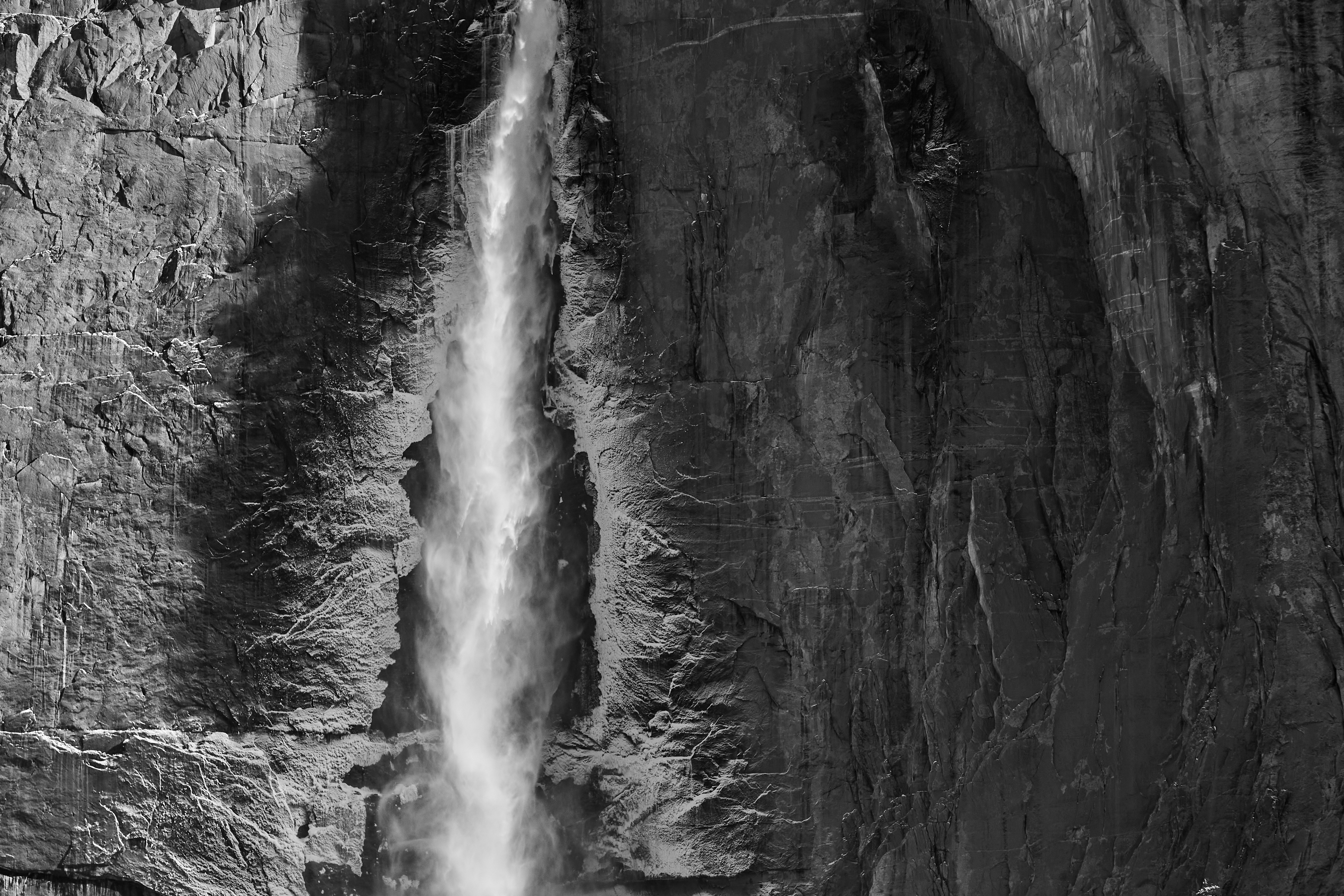 Black and white image of waterfall at Yosemite National Park, USA, travel photography