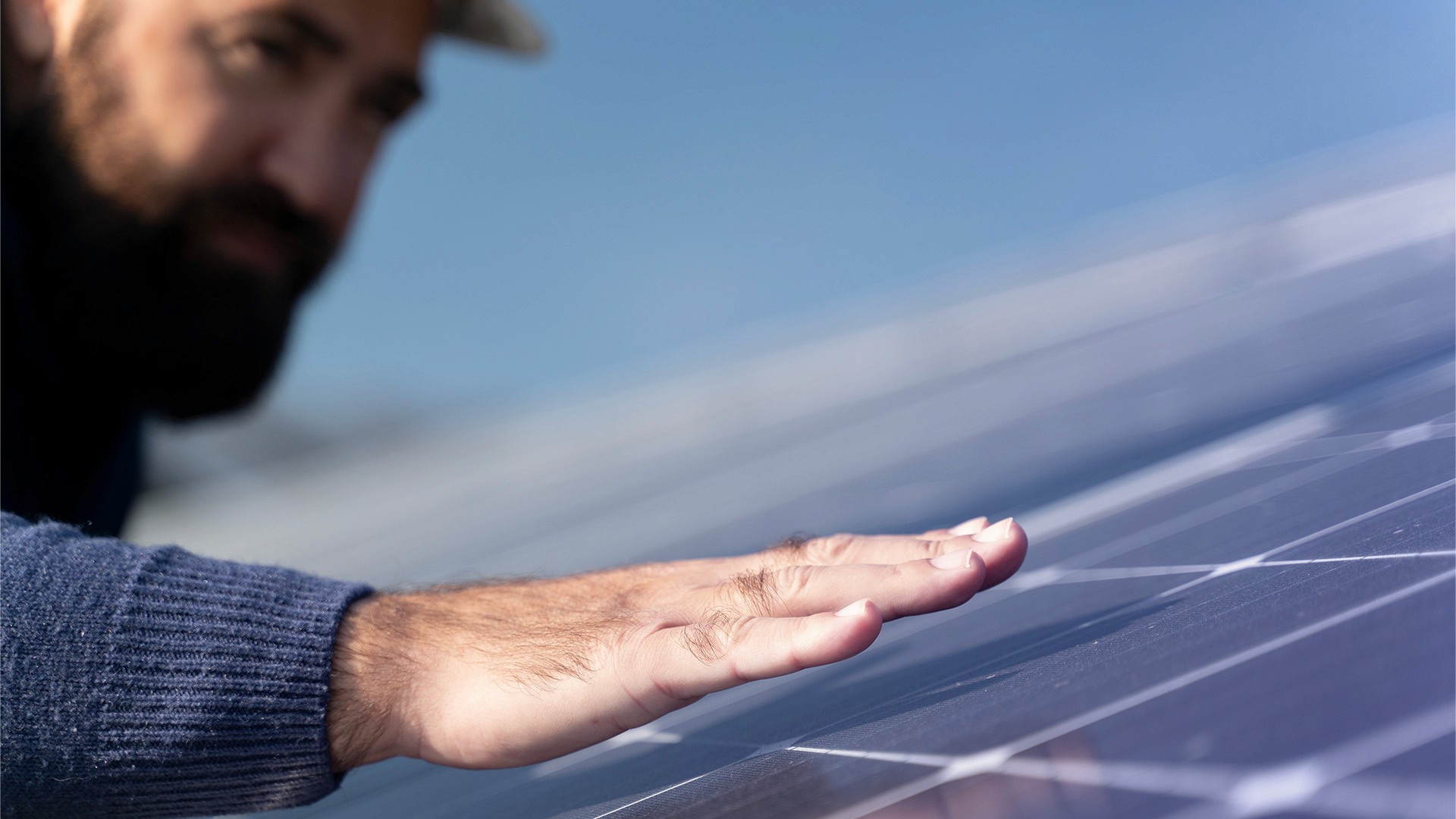 person making a contactless payment with a card