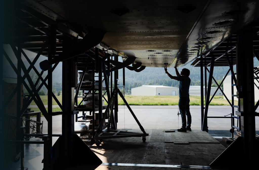 Man working at CNC machine