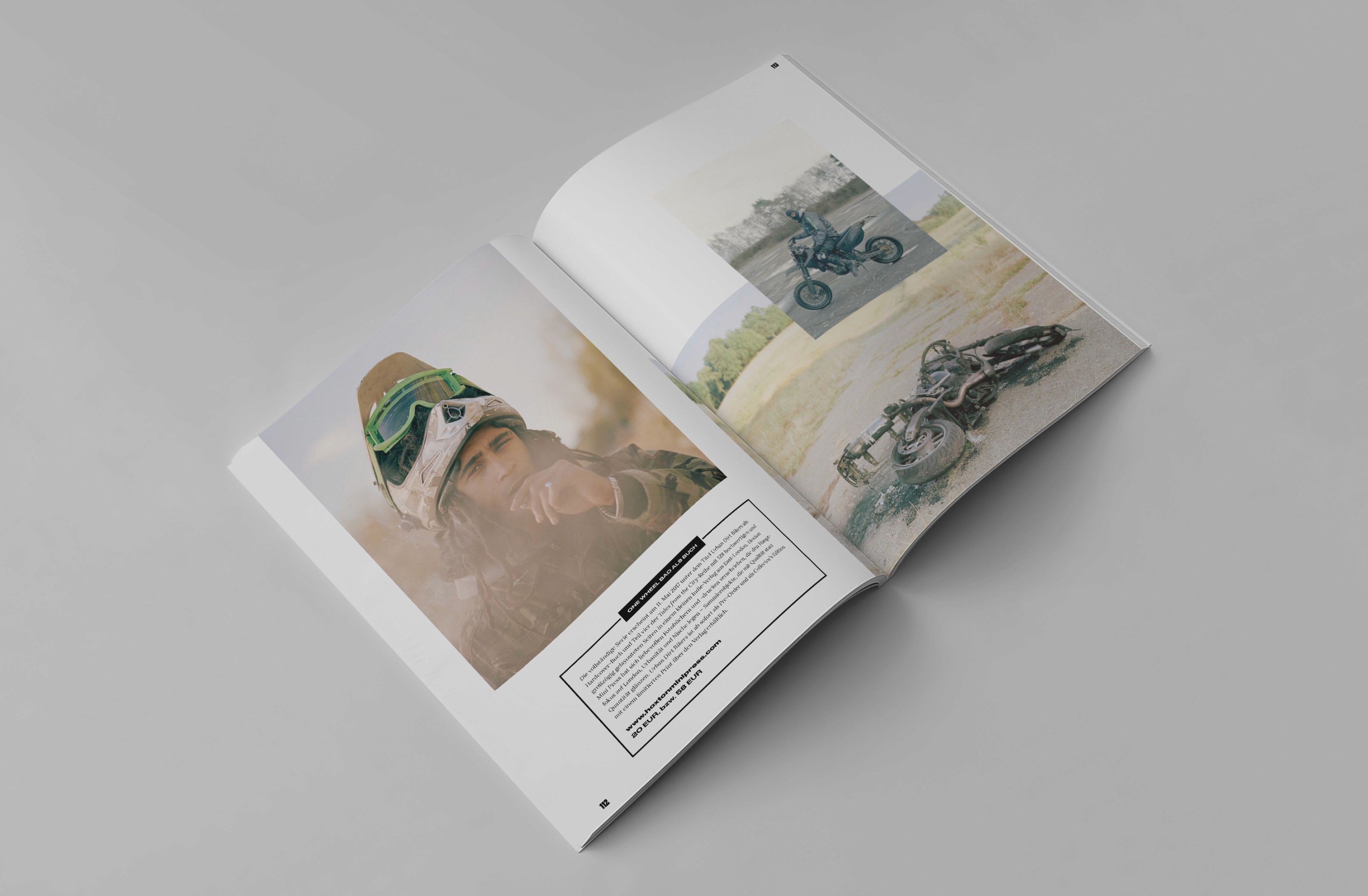 A close-up image of an open magazine featuring motocross photography with a focus on a rider in gear and a motorcycle.